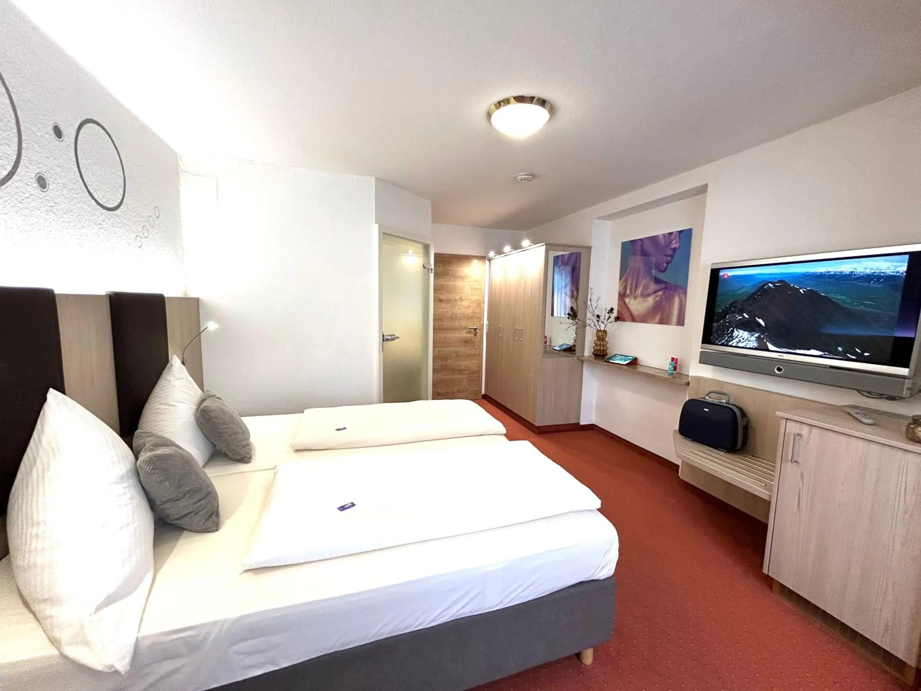 TV and multimedia, Bed in Würmtaler Gästehaus