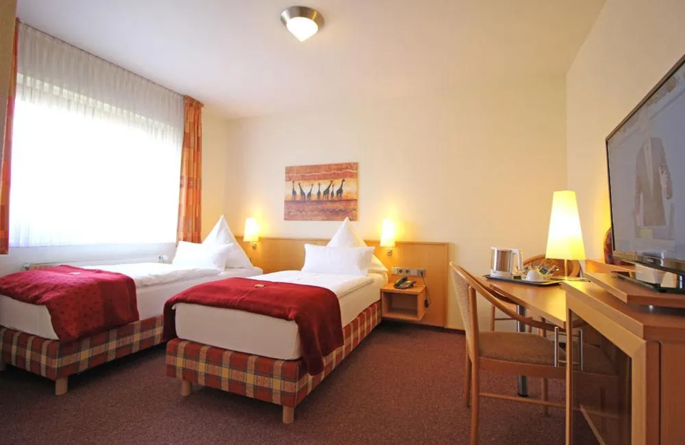 Photo of the whole room, Bed in Hotel Lindenkrug