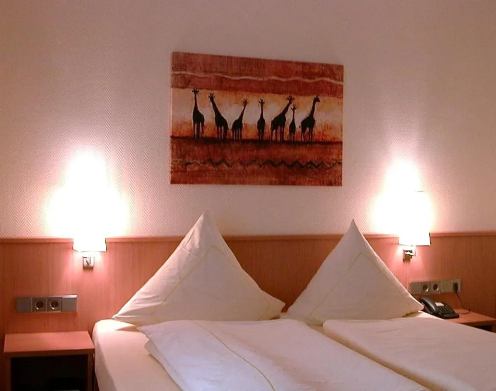 Photo of the whole room, Bed in Hotel Lindenkrug