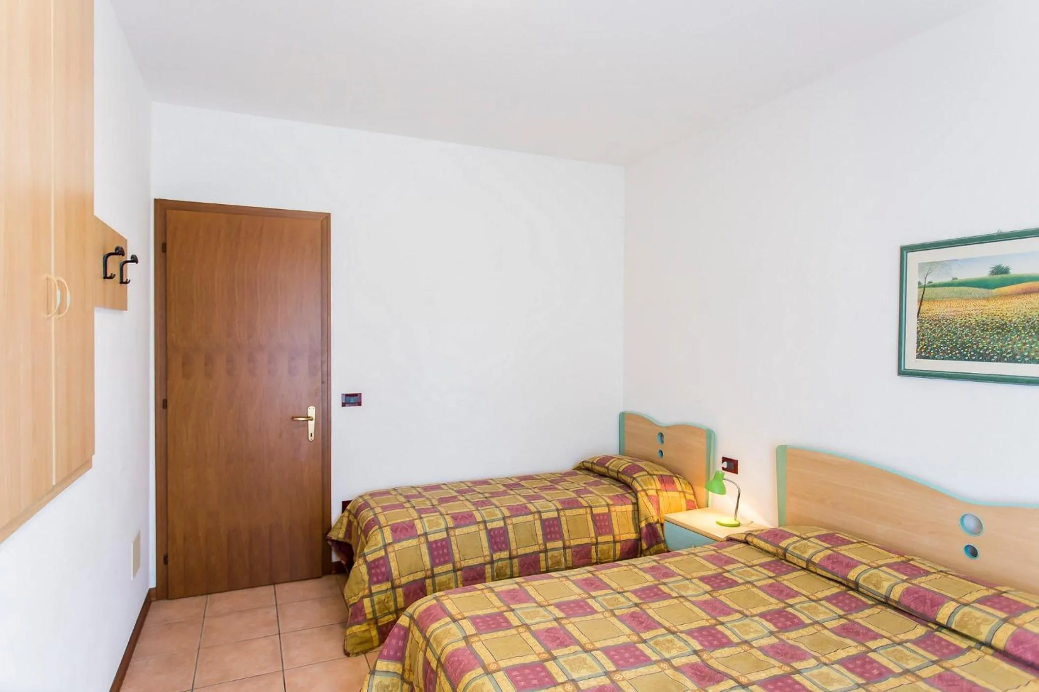 Bed in Villaggio Calycanthus