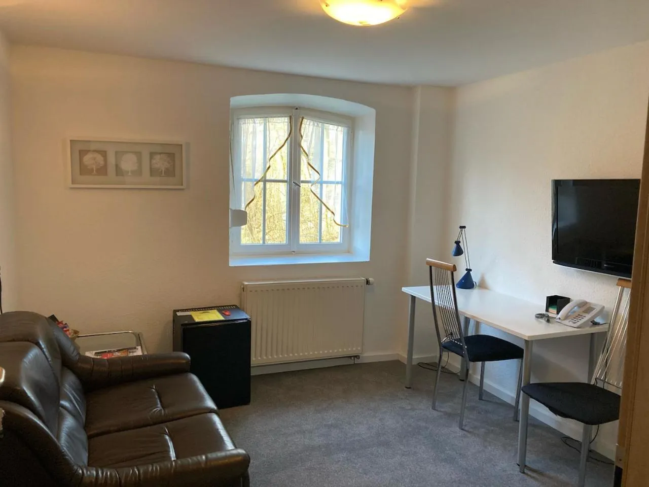 Communal lounge/ TV room in Hotel Wintersmühle