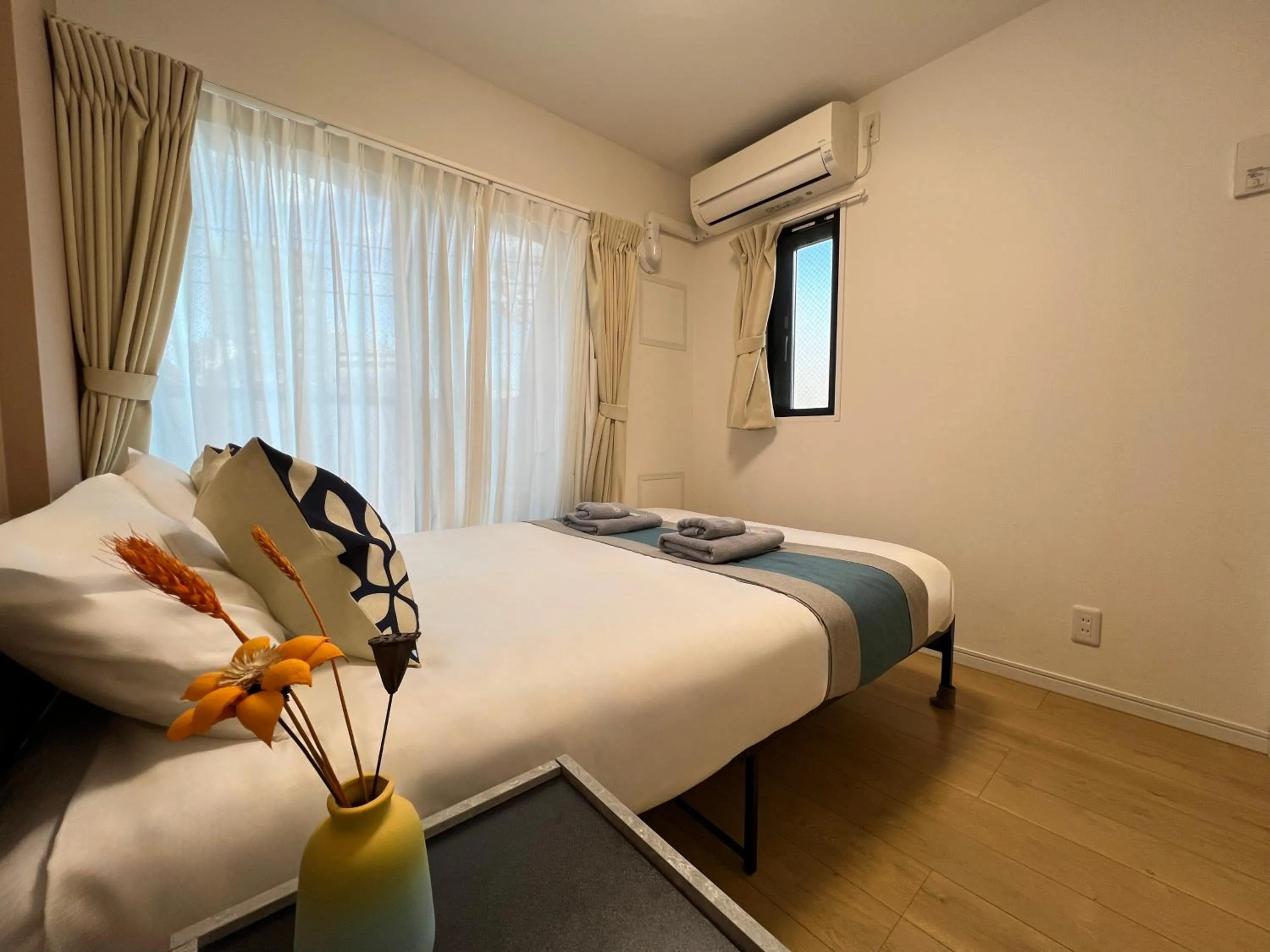 Bed in nestay inn tokyo kagurazaka