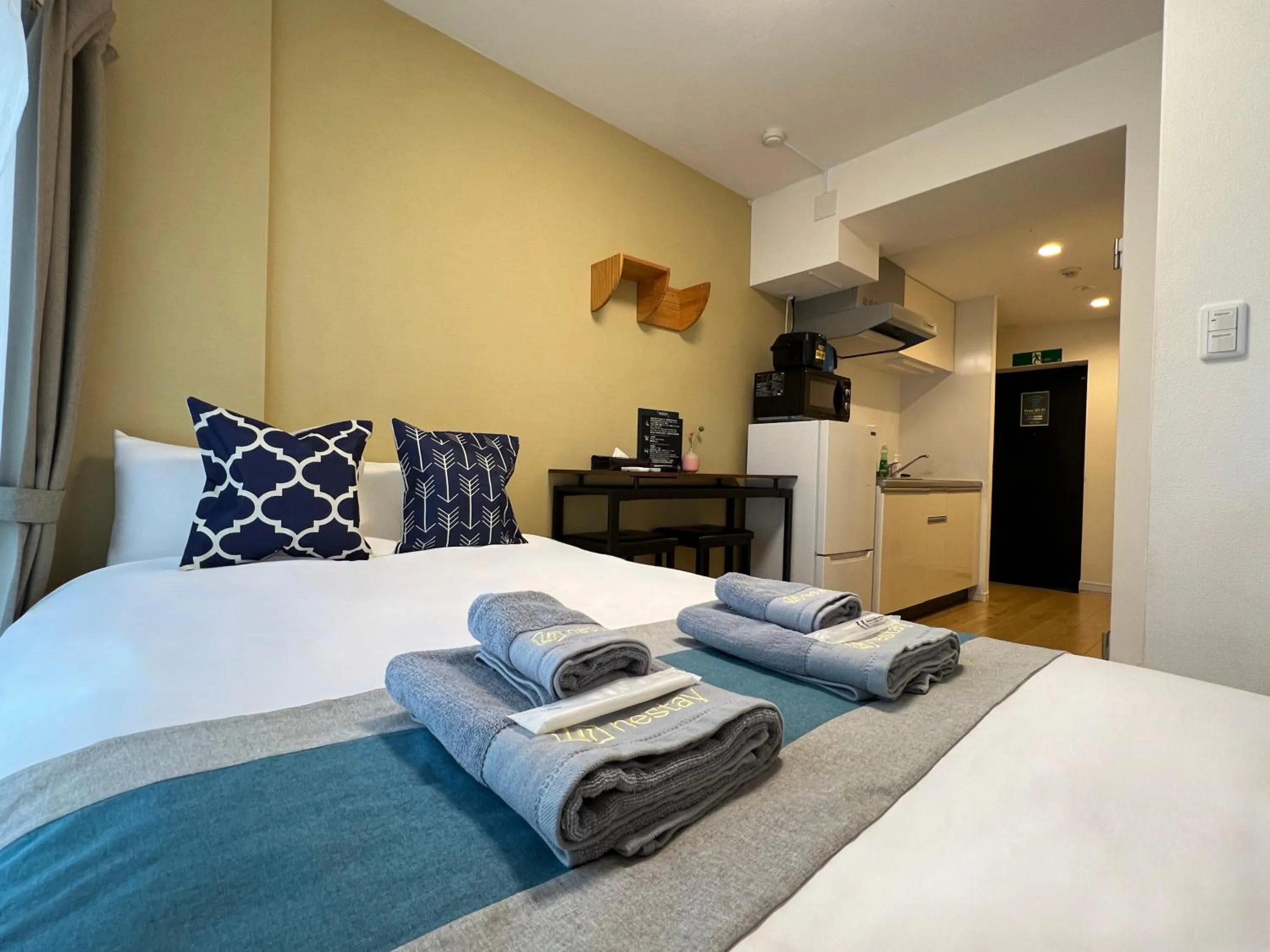 Bed in nestay inn tokyo kagurazaka