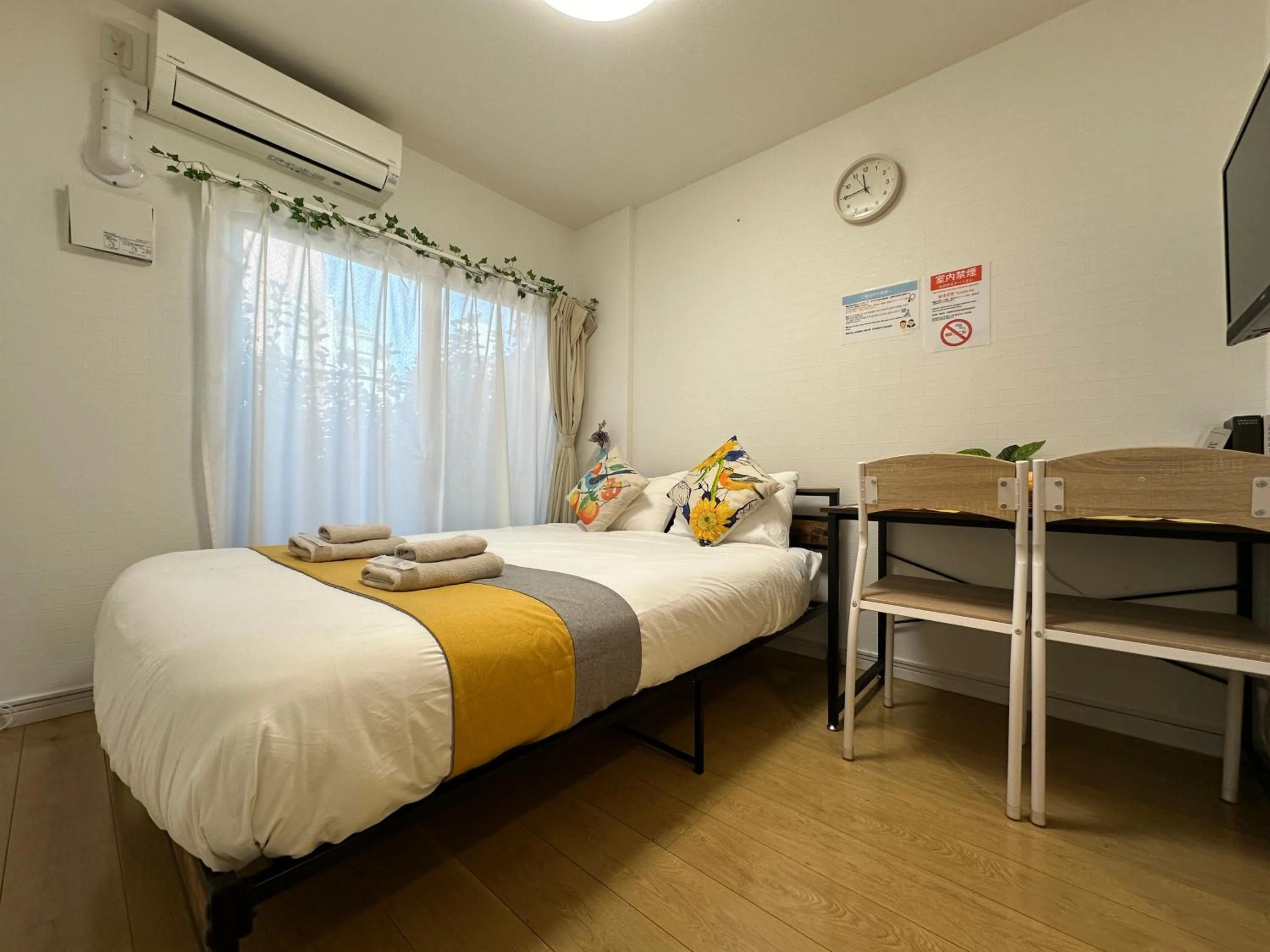 Bed in nestay inn tokyo kagurazaka