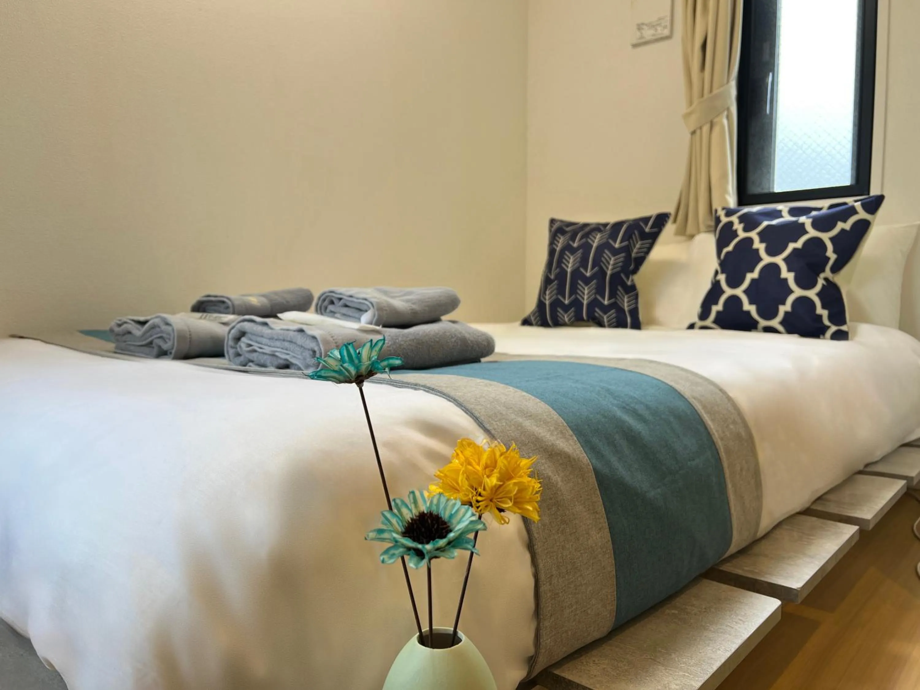 Bed in nestay inn tokyo kagurazaka