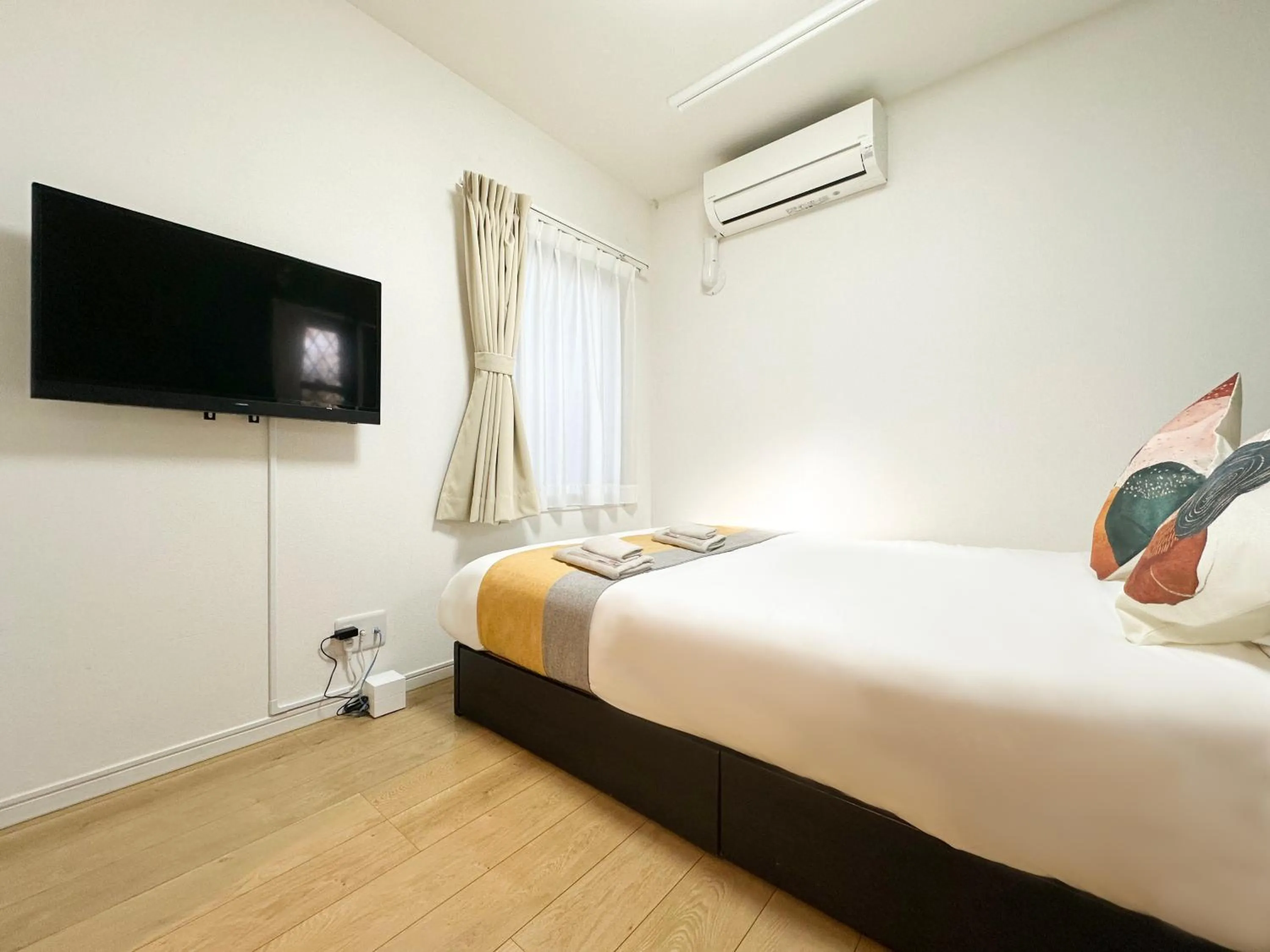 Bed in nestay inn tokyo kagurazaka