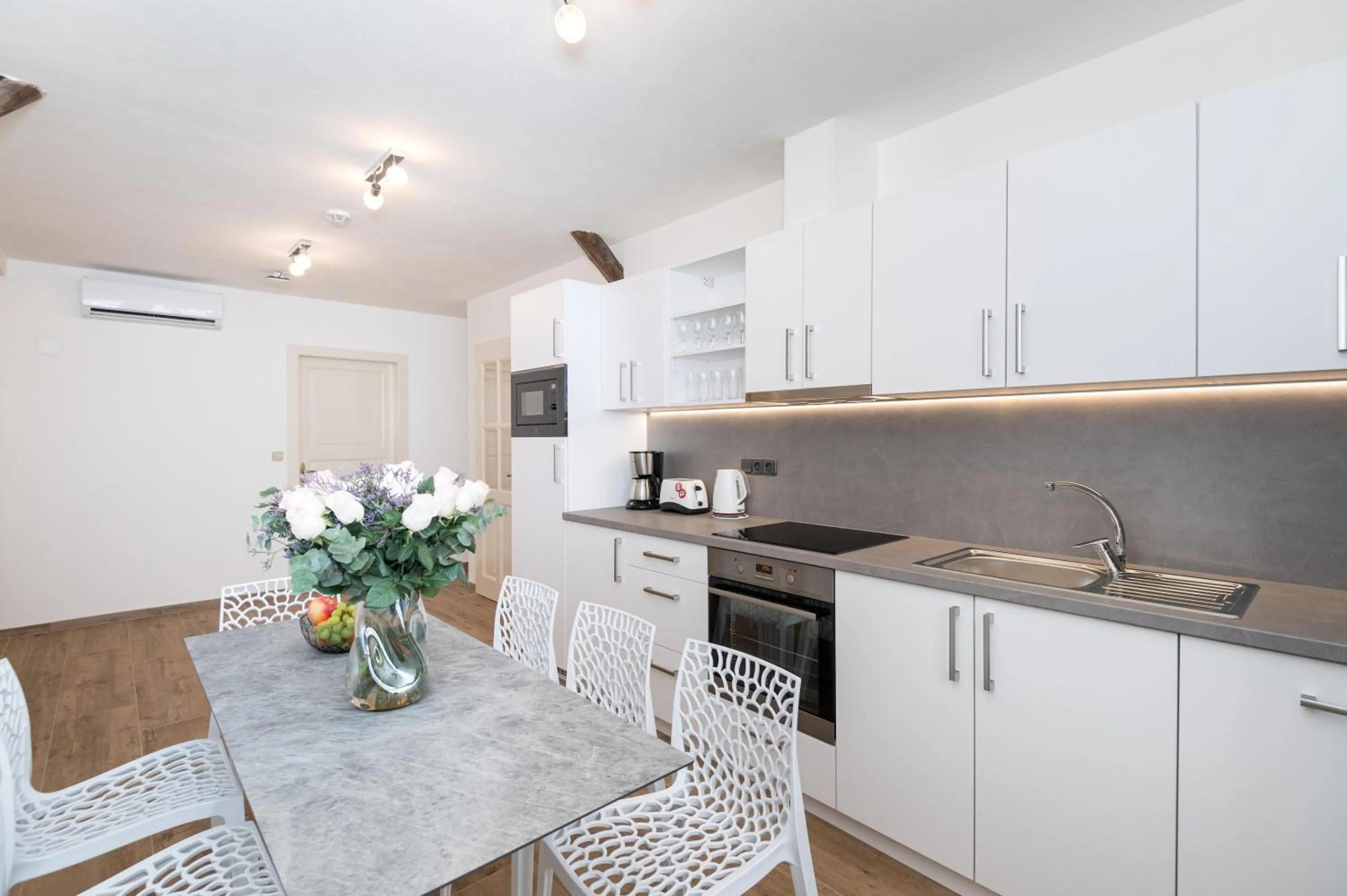 Kitchen or kitchenette in Eight Secrets Boutique Residence by Dwellfort