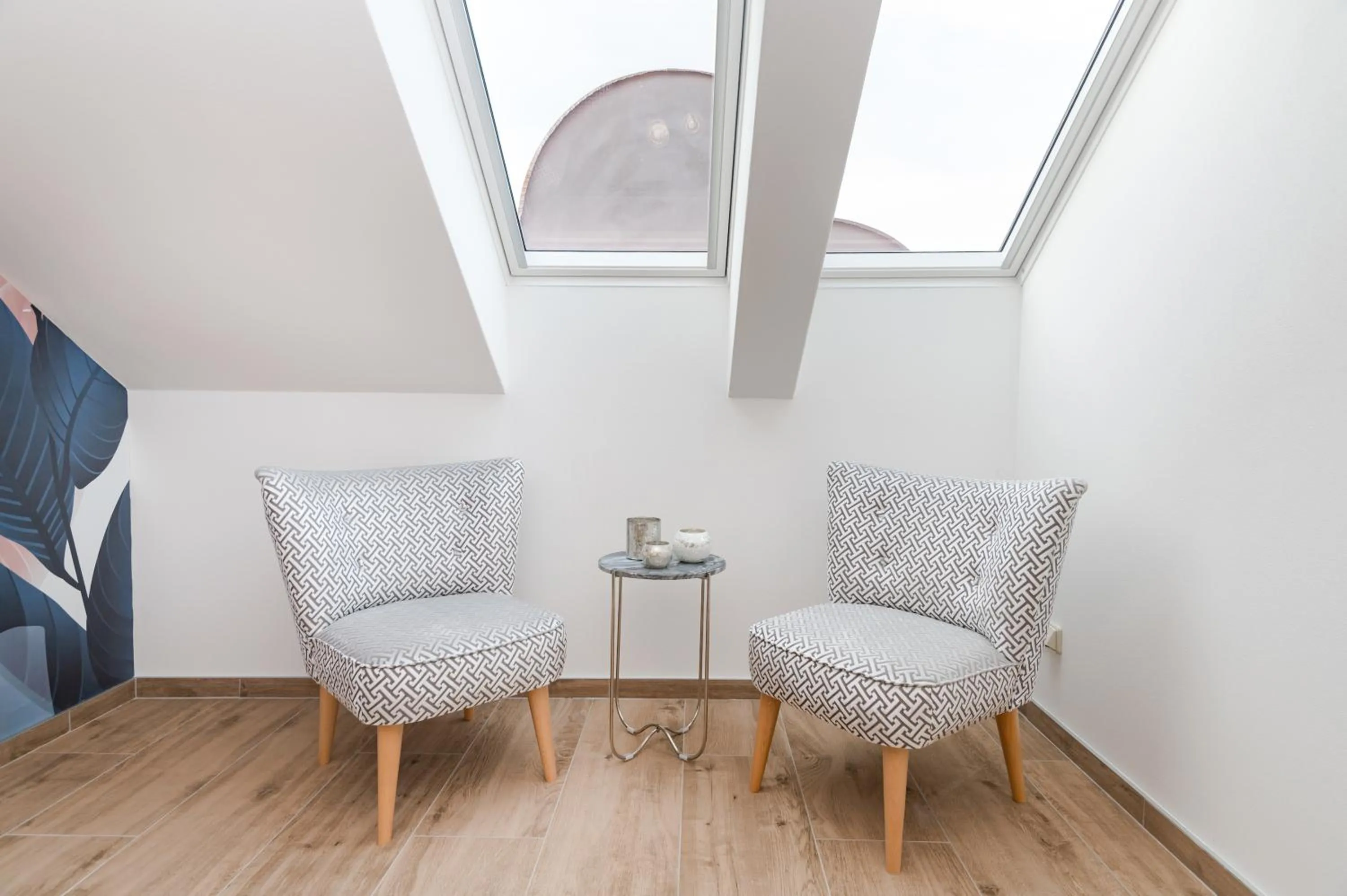 Seating area in Eight Secrets Boutique Residence by Dwellfort