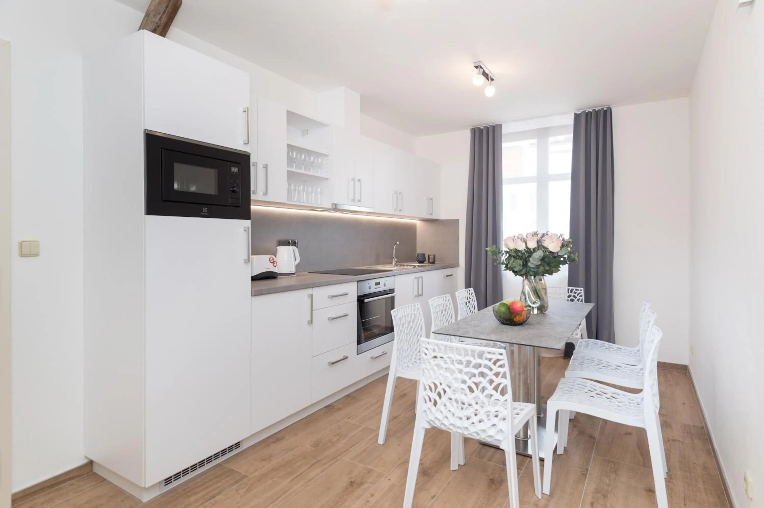 Kitchen or kitchenette in Eight Secrets Boutique Residence by Dwellfort