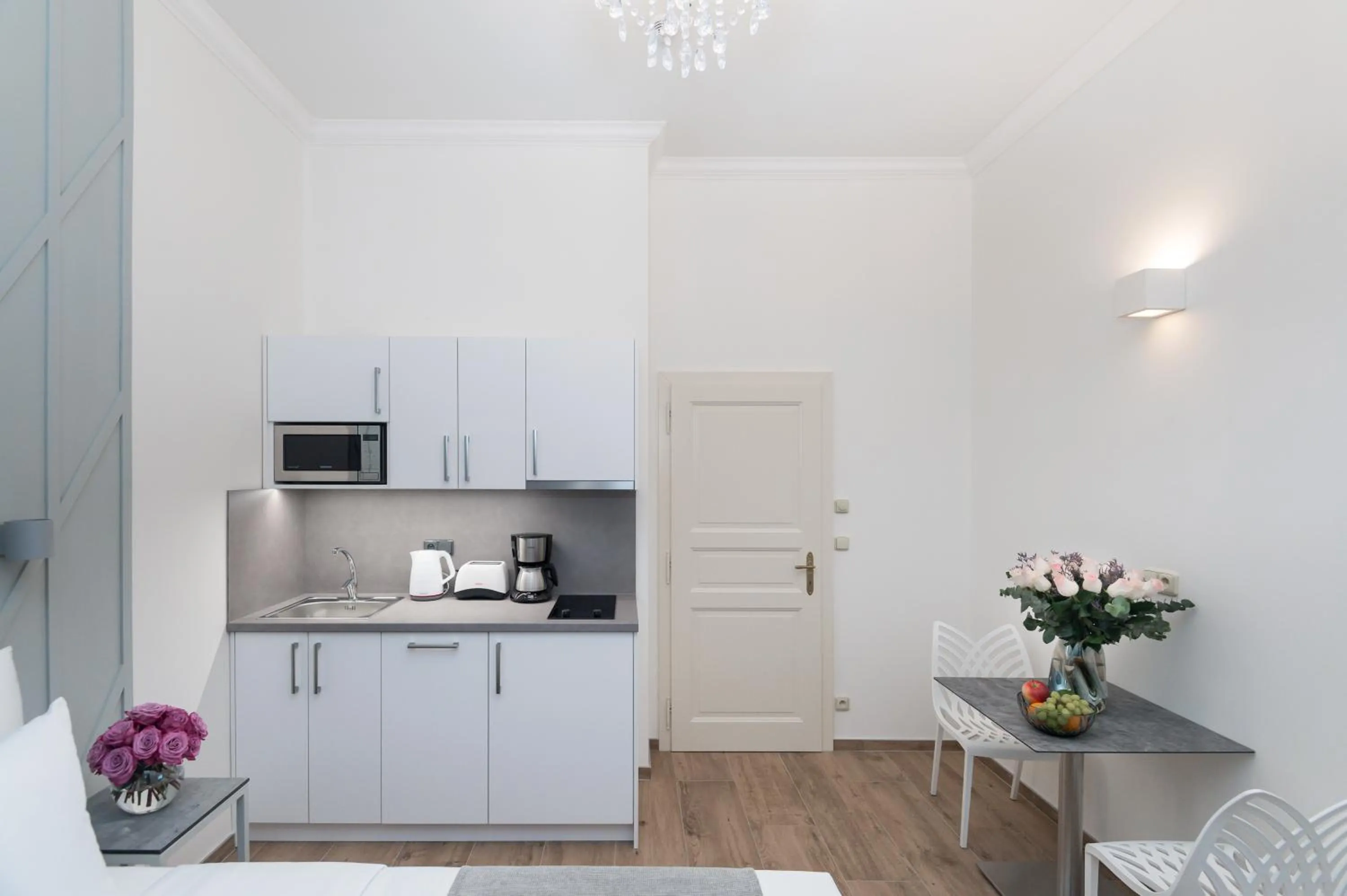 Kitchen or kitchenette in Eight Secrets Boutique Residence by Dwellfort