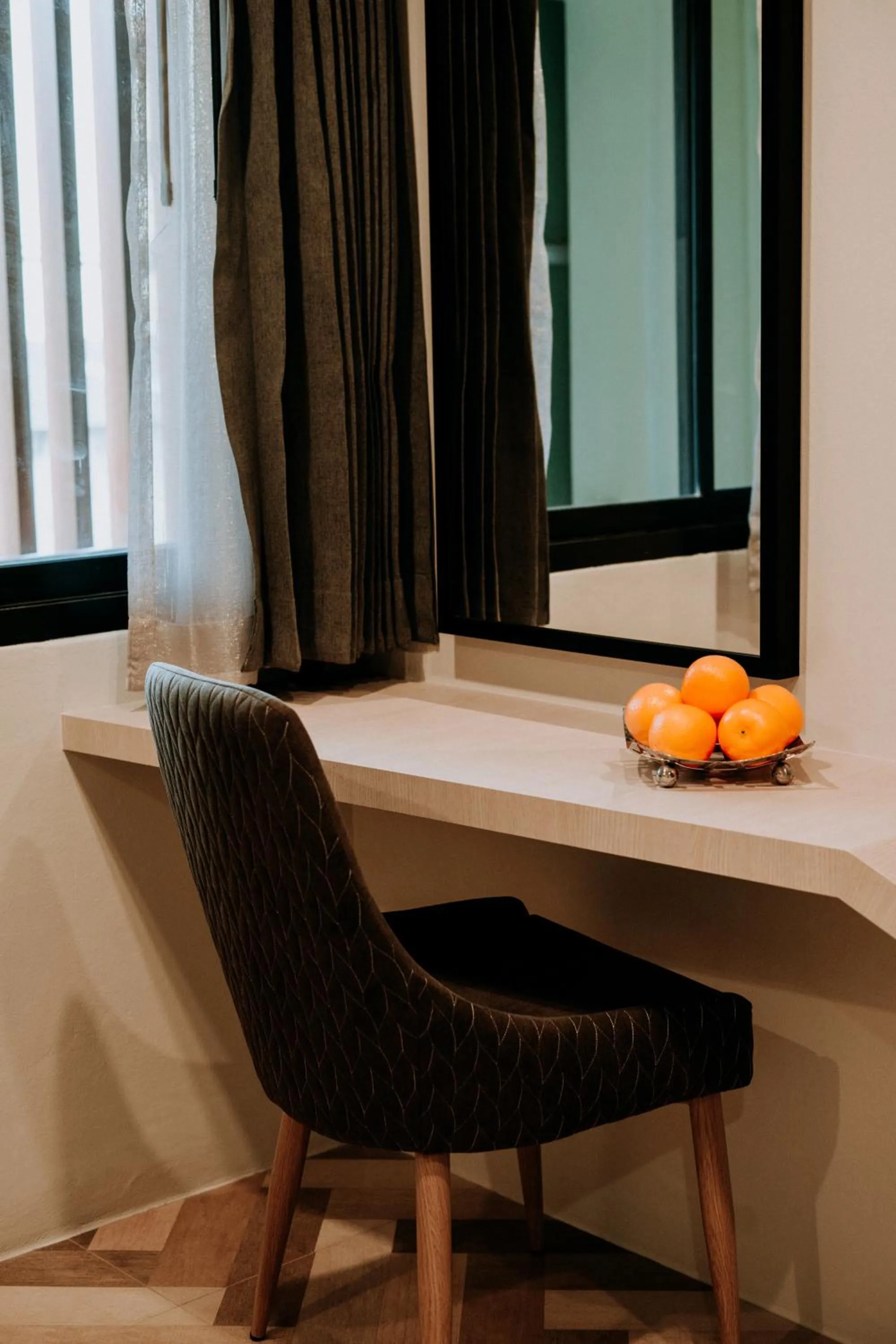 Seating area in SJ Miracle Hotel