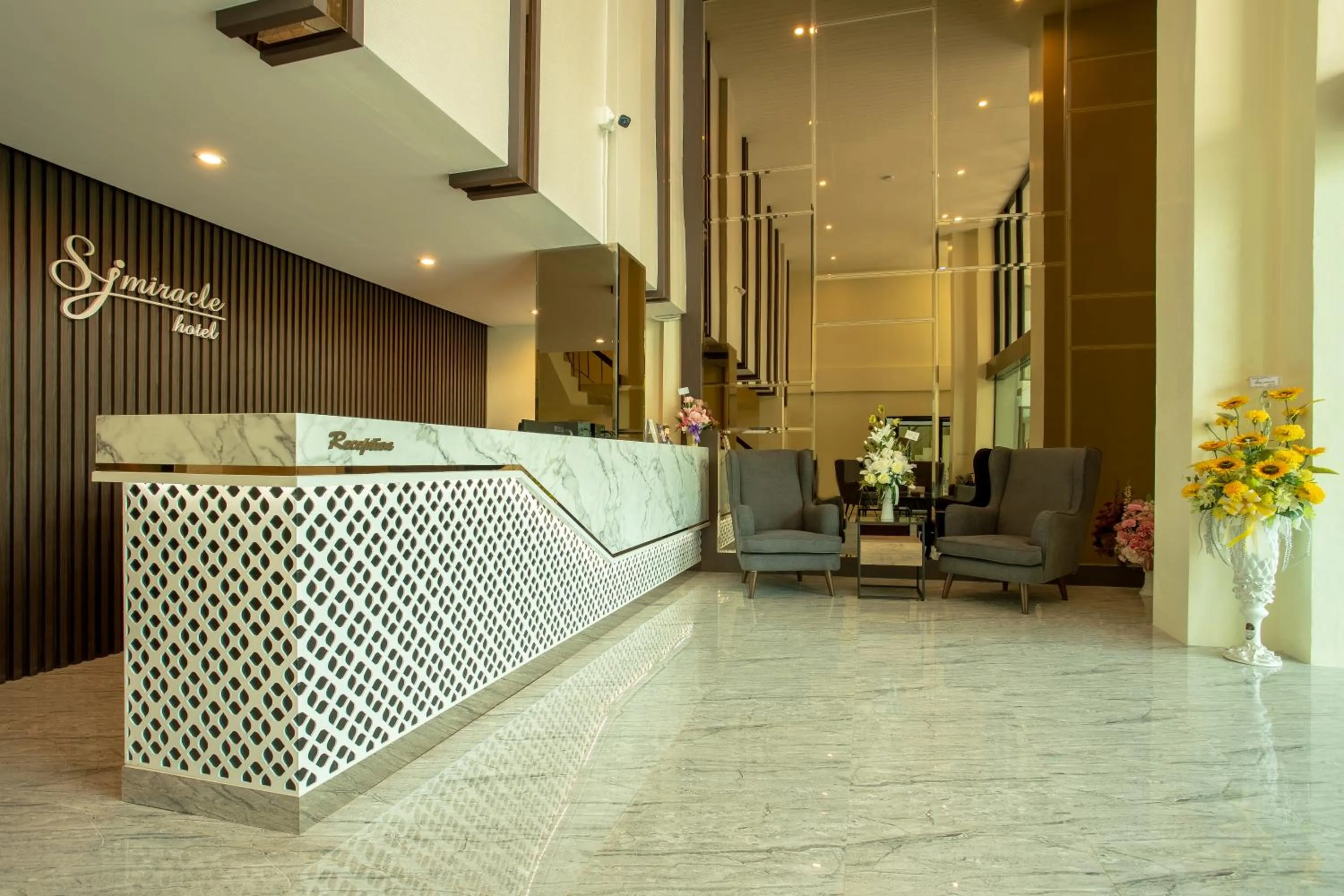 Lobby or reception in SJ Miracle Hotel
