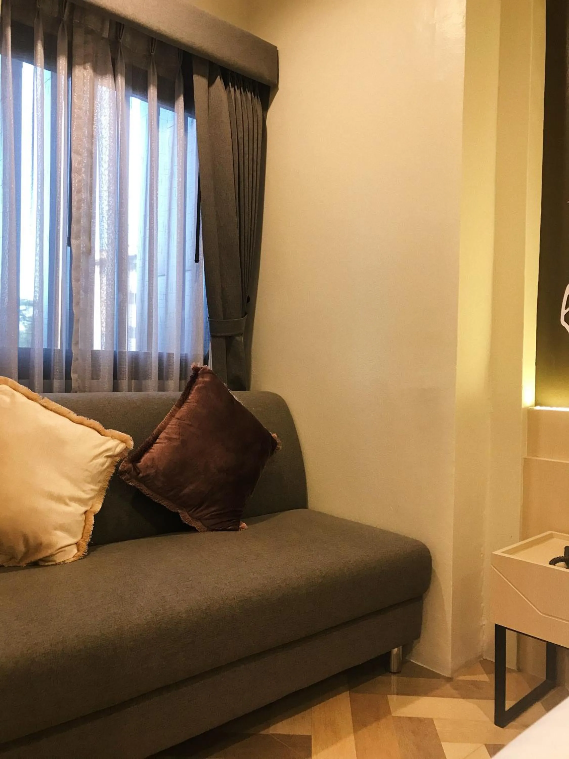 Seating area in SJ Miracle Hotel