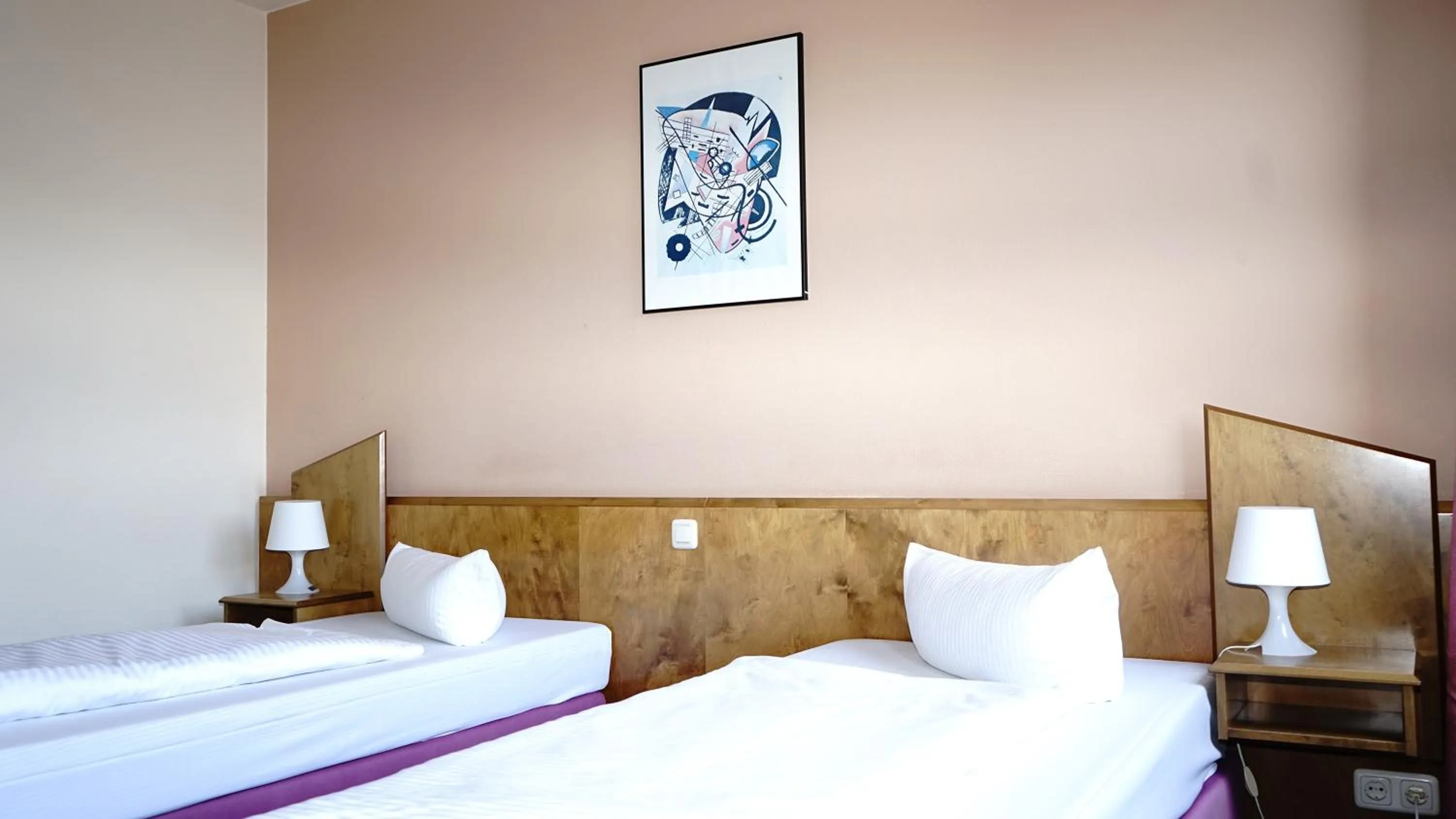 Bed in ITM Entrée Glinde Restaurant & Tagungshotel