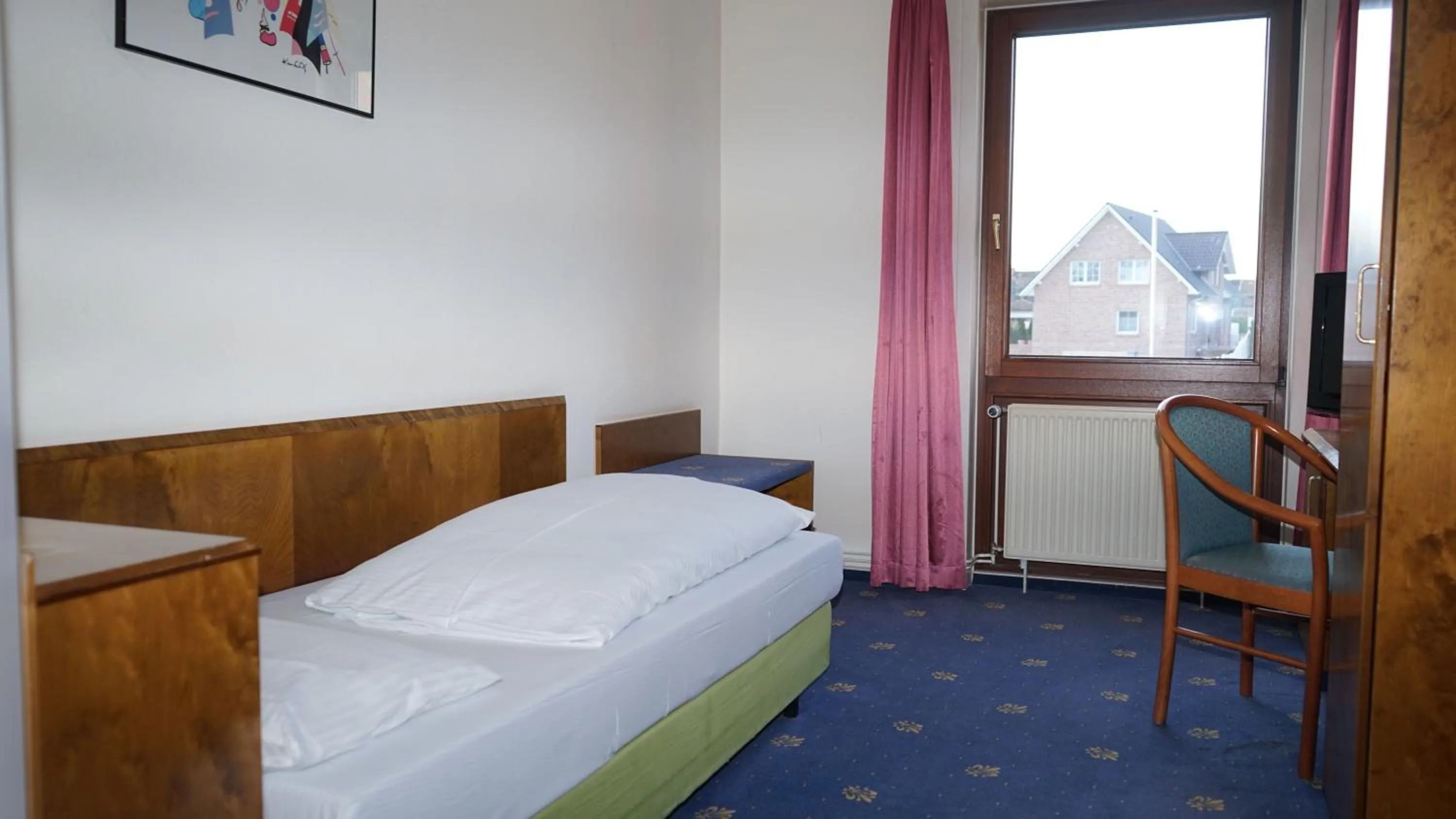 Bed in ITM Entrée Glinde Restaurant & Tagungshotel