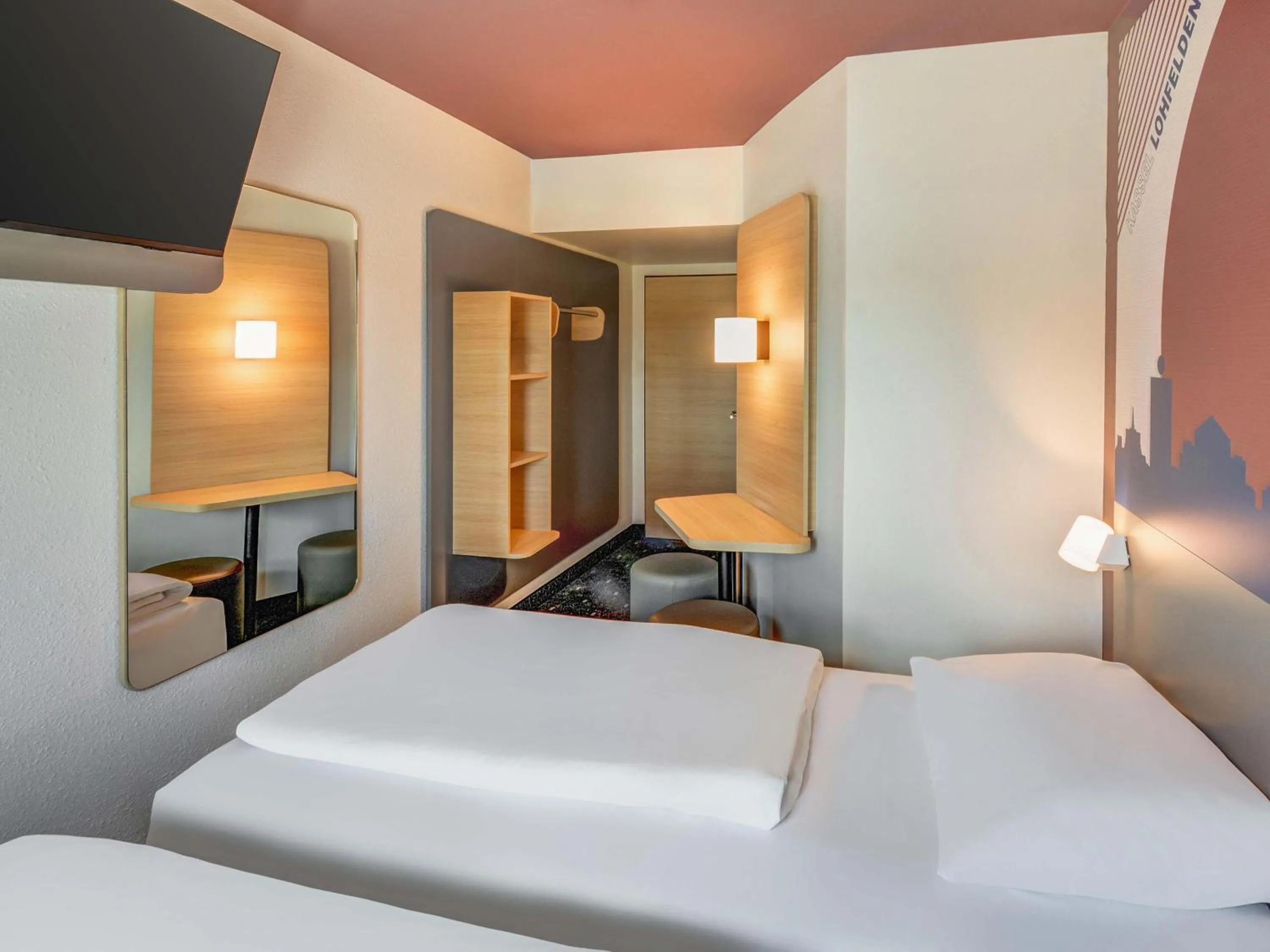 Photo of the whole room, Bed in B&B HOTEL Kassel-Lohfelden