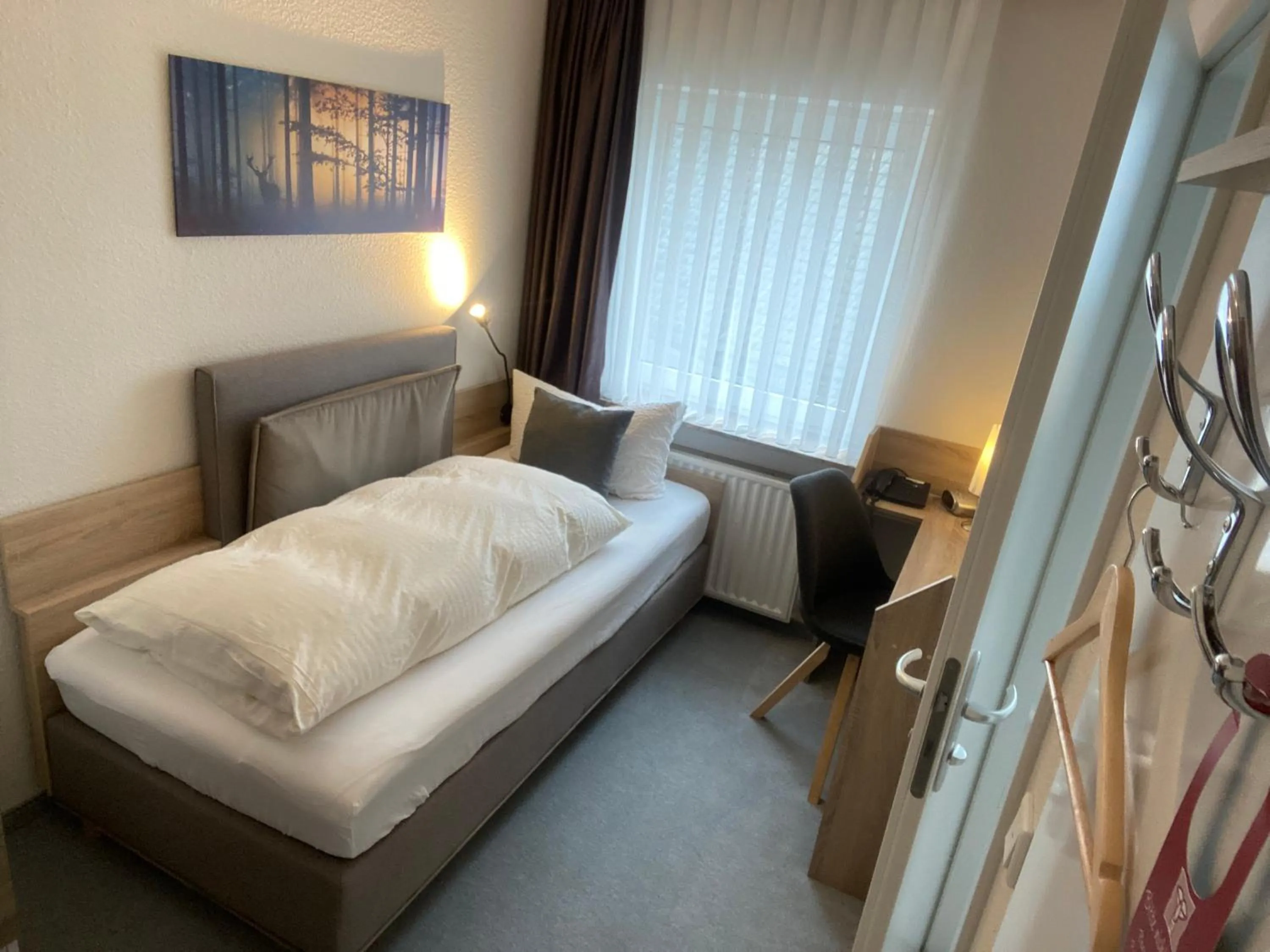 Photo of the whole room, Bed in Sevda's Hotel Garni Weinforth