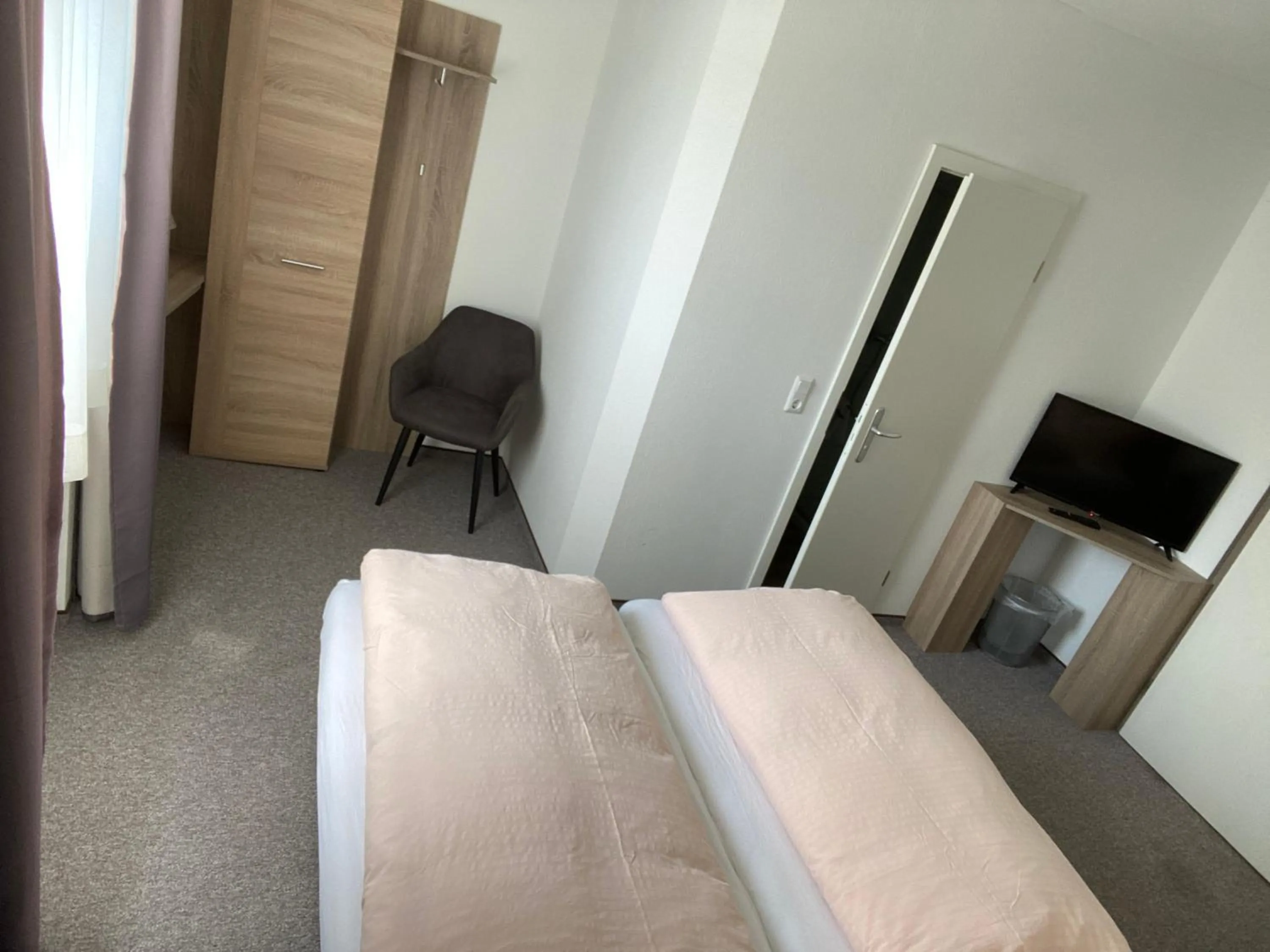 Photo of the whole room, Bed in Sevda's Hotel Garni Weinforth