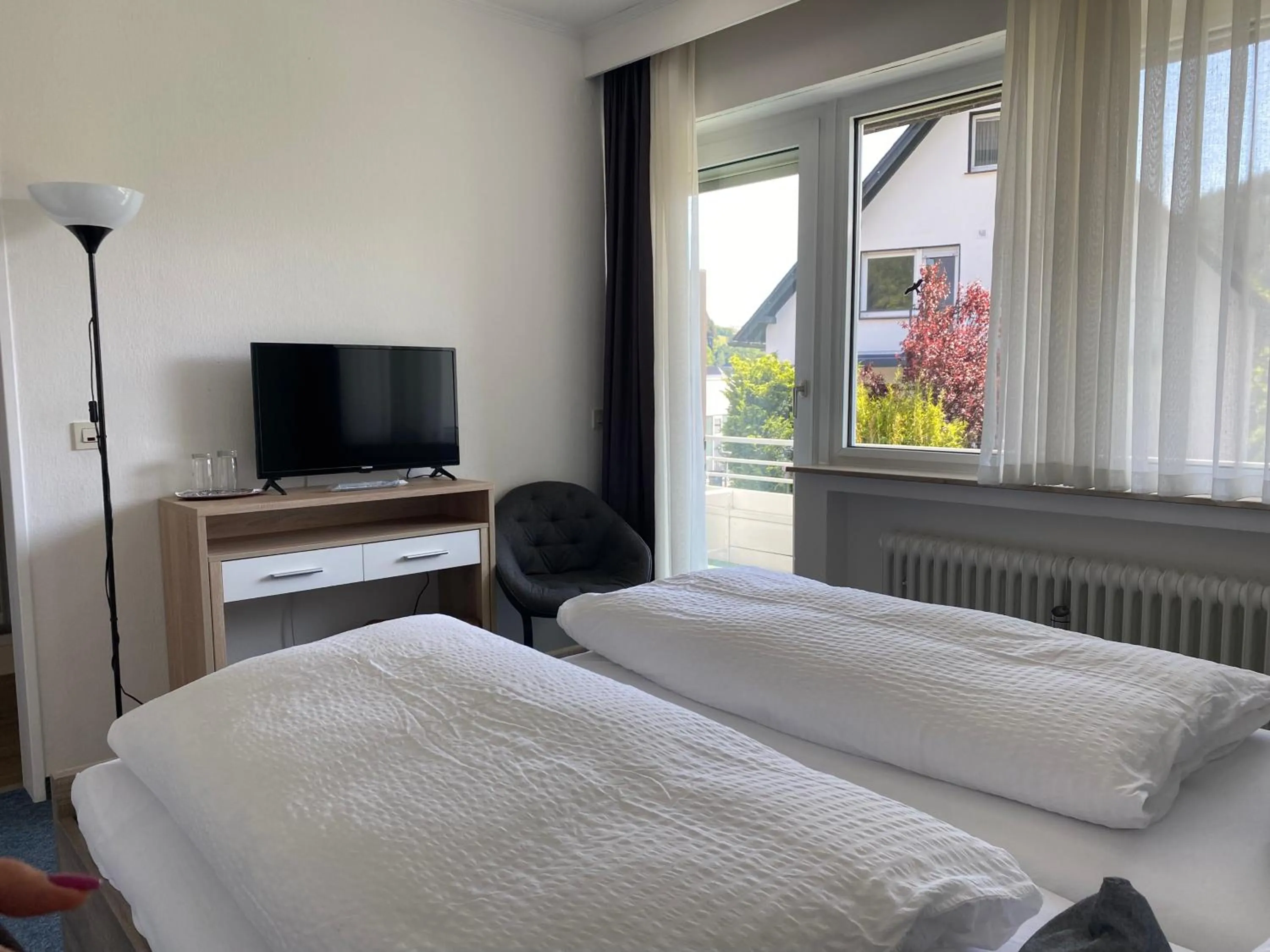 Bed in Sevda's Hotel Garni Weinforth