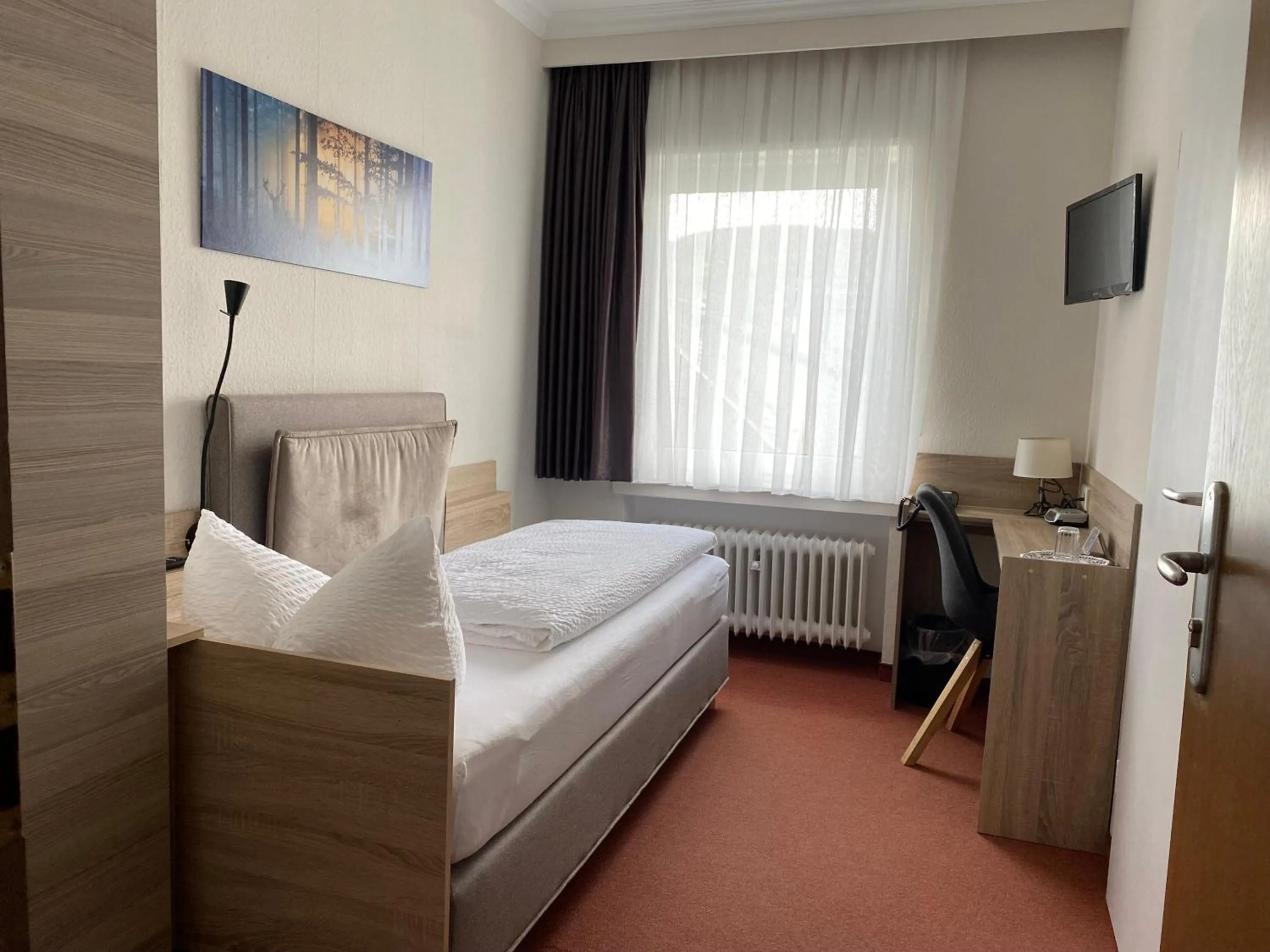 Photo of the whole room, Bed in Sevda's Hotel Garni Weinforth