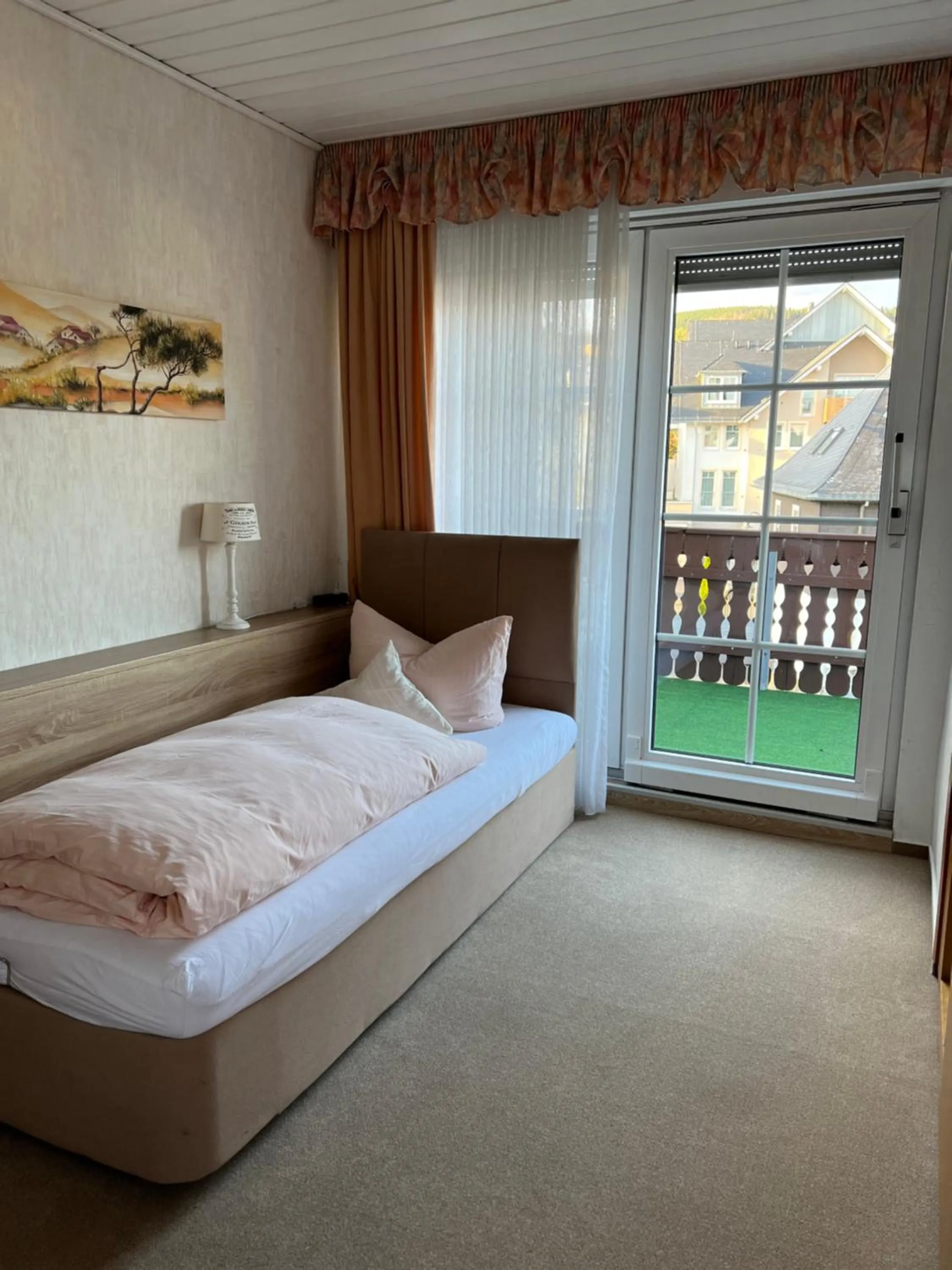 Photo of the whole room, Bed in Sevda's Hotel Garni Weinforth