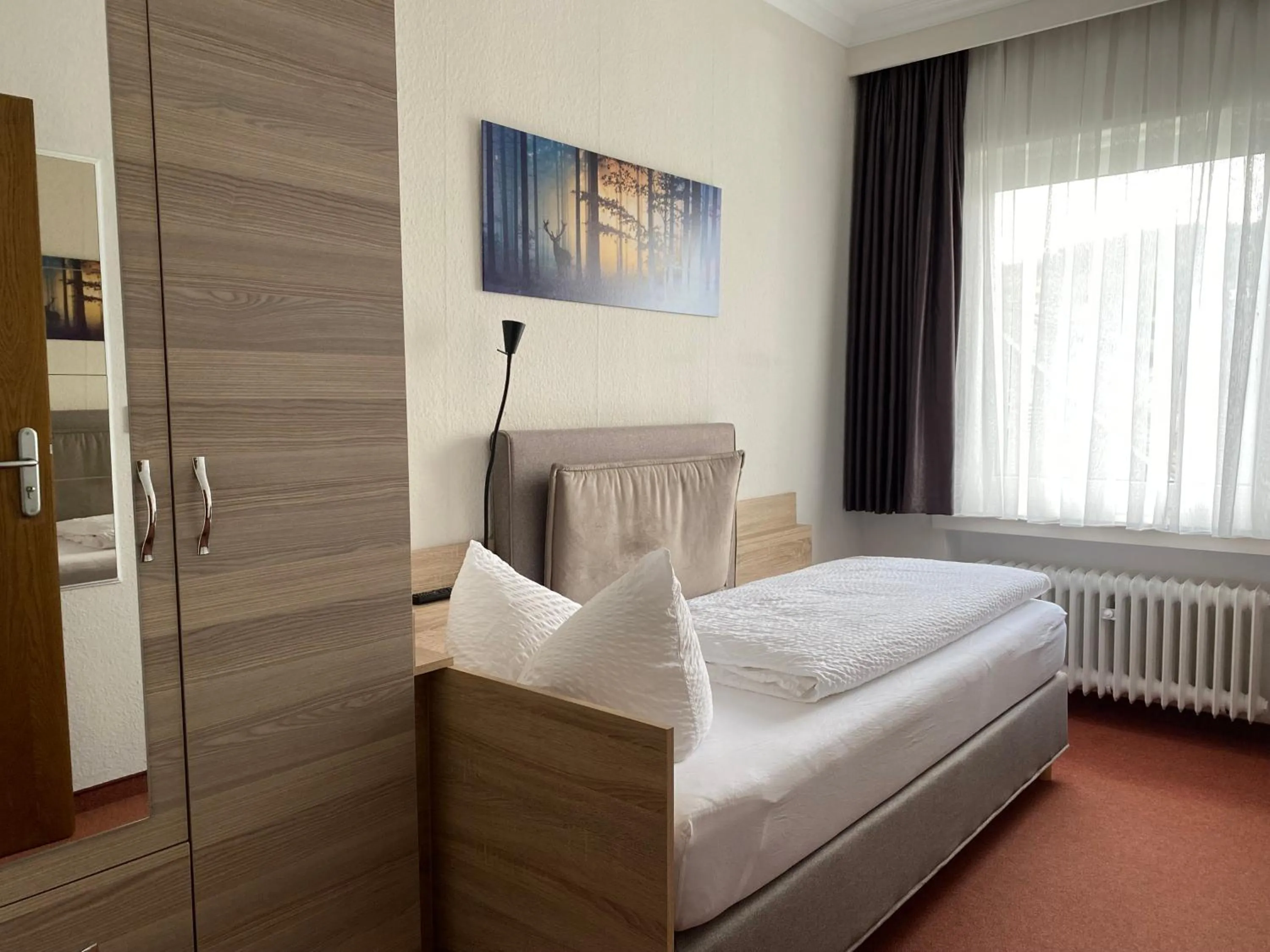 Photo of the whole room, Bed in Sevda's Hotel Garni Weinforth