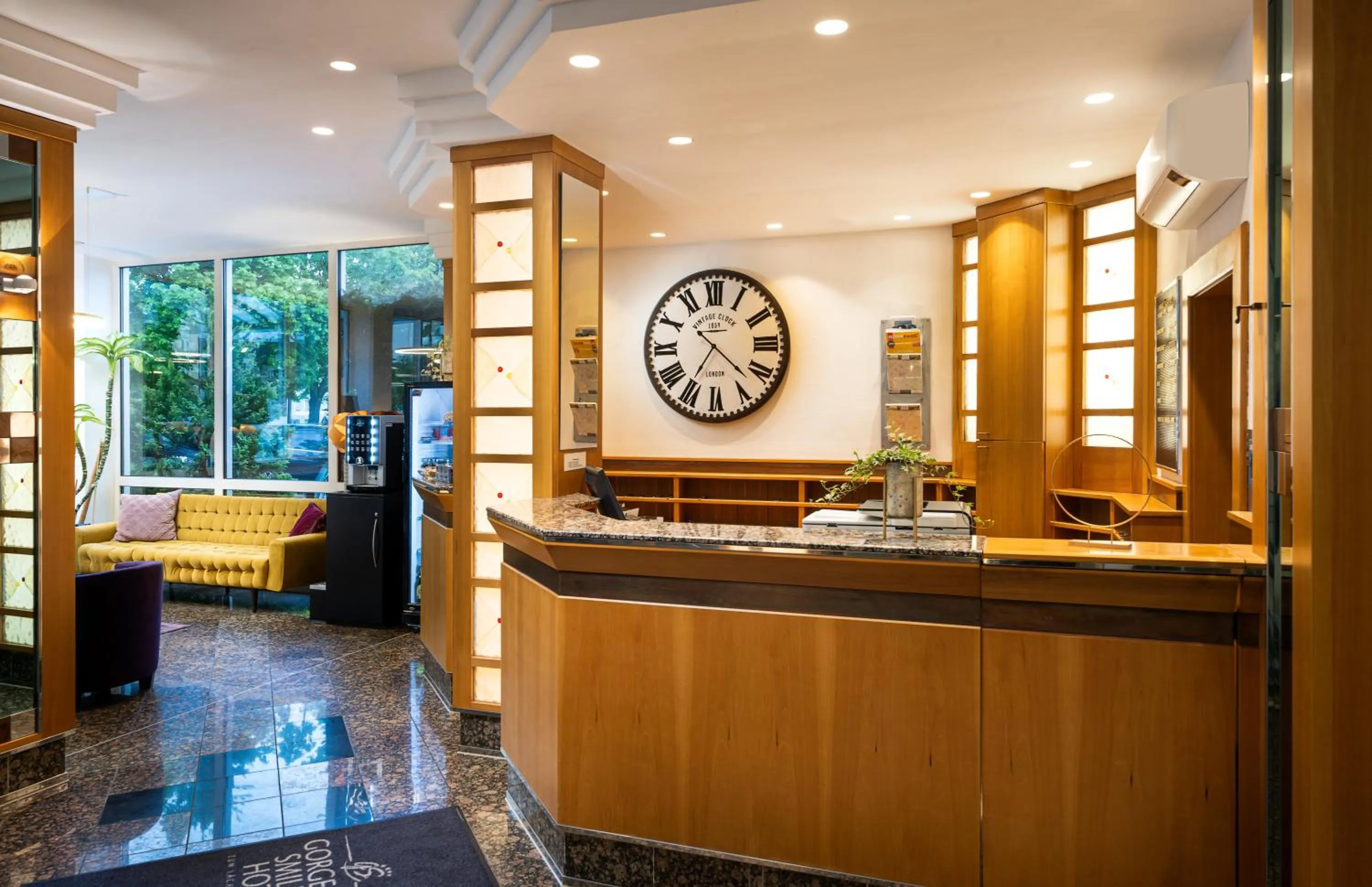 Lobby or reception in QU Hotel Augsburg