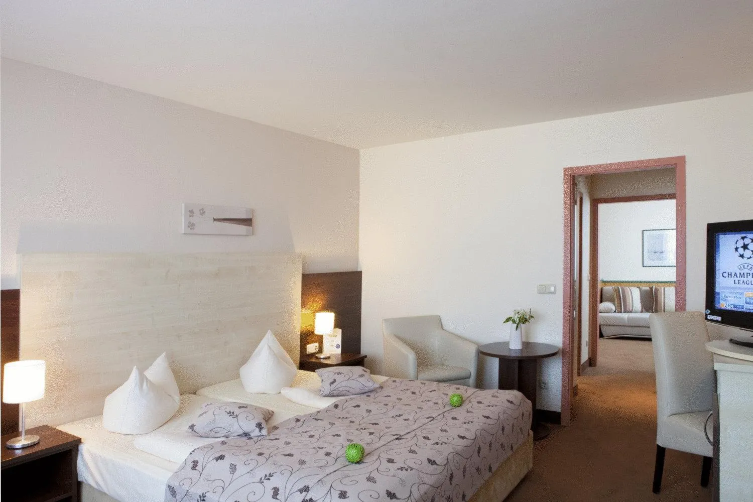 Photo of the whole room, Bed in QU Hotel Augsburg