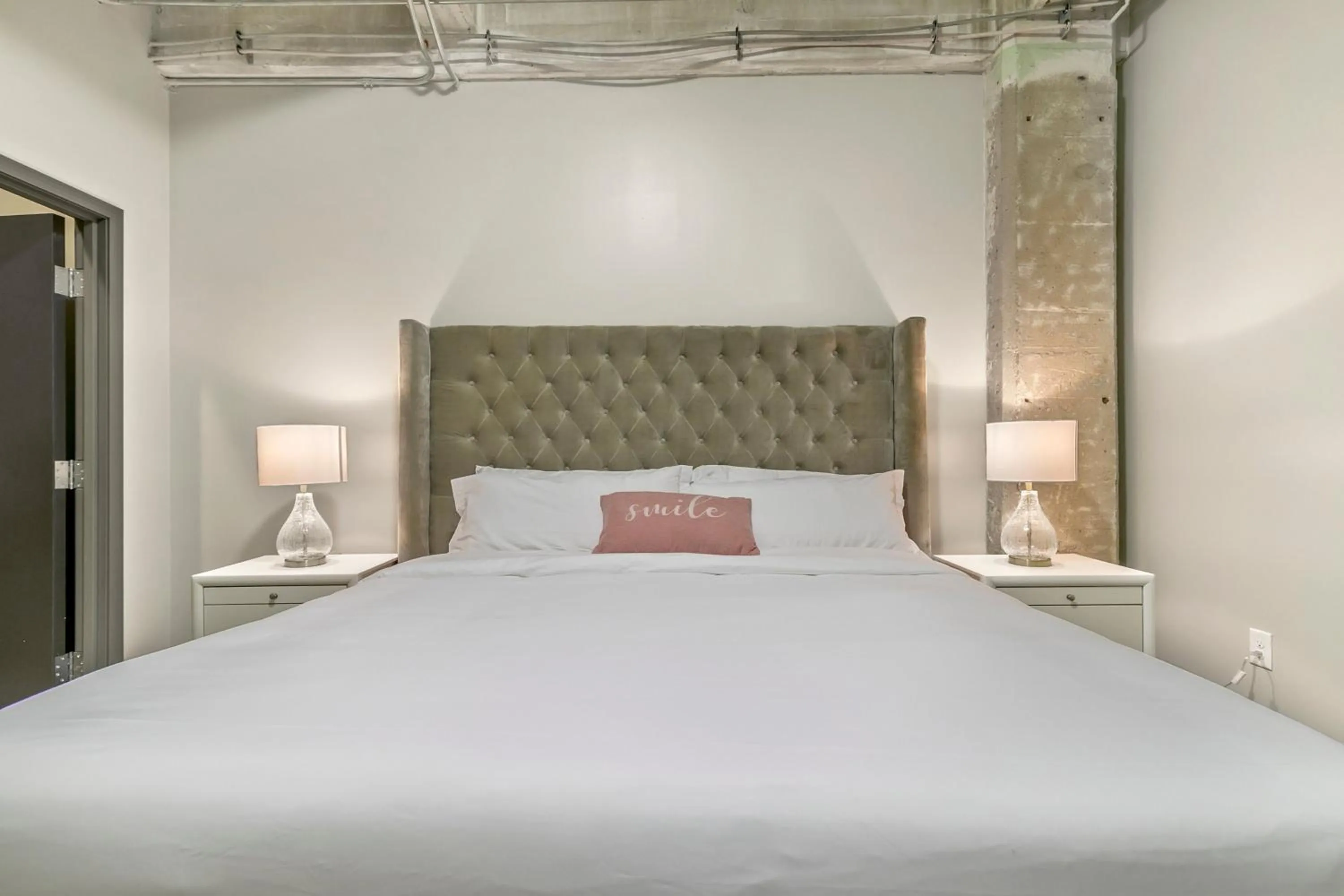 Bed in Luxury Downtown Dallas Stay by Amyfinehouse