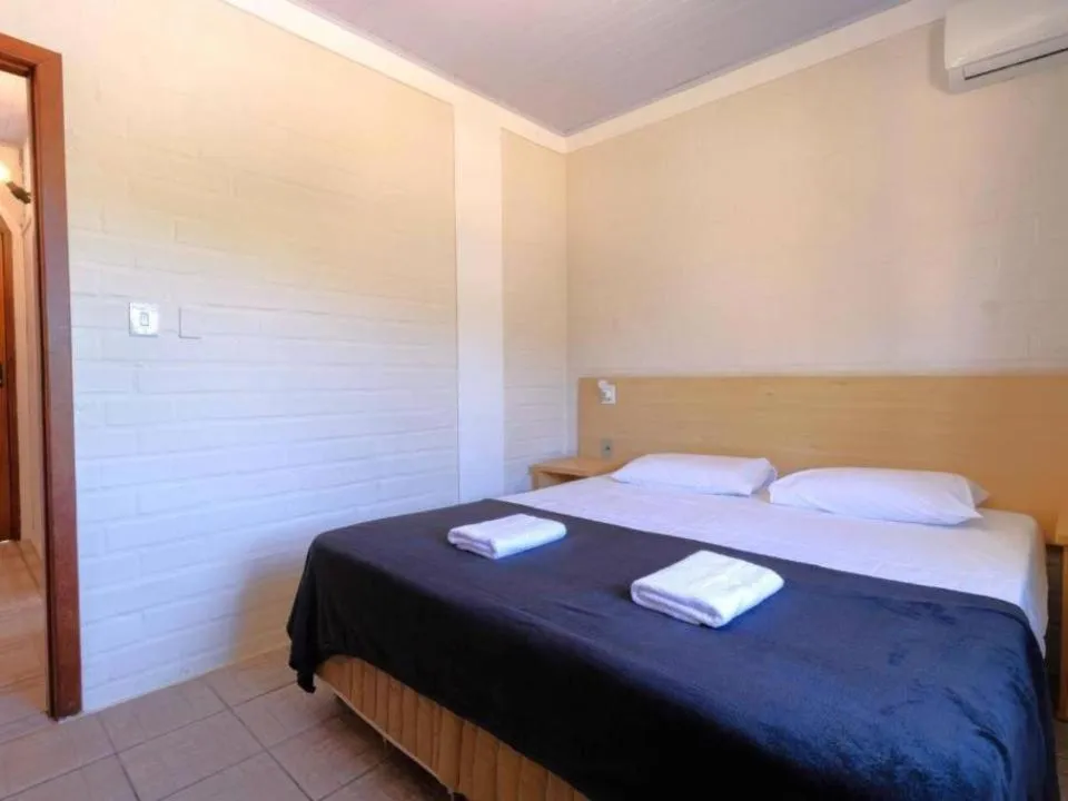 Bed in Pousada Maré de Lua