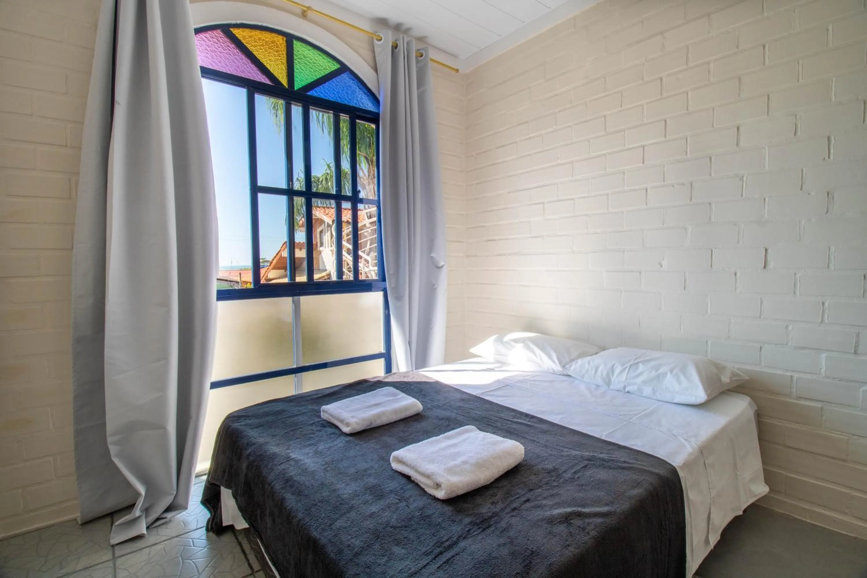 Bed in Pousada Maré de Lua