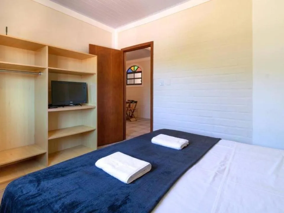 Bed in Pousada Maré de Lua