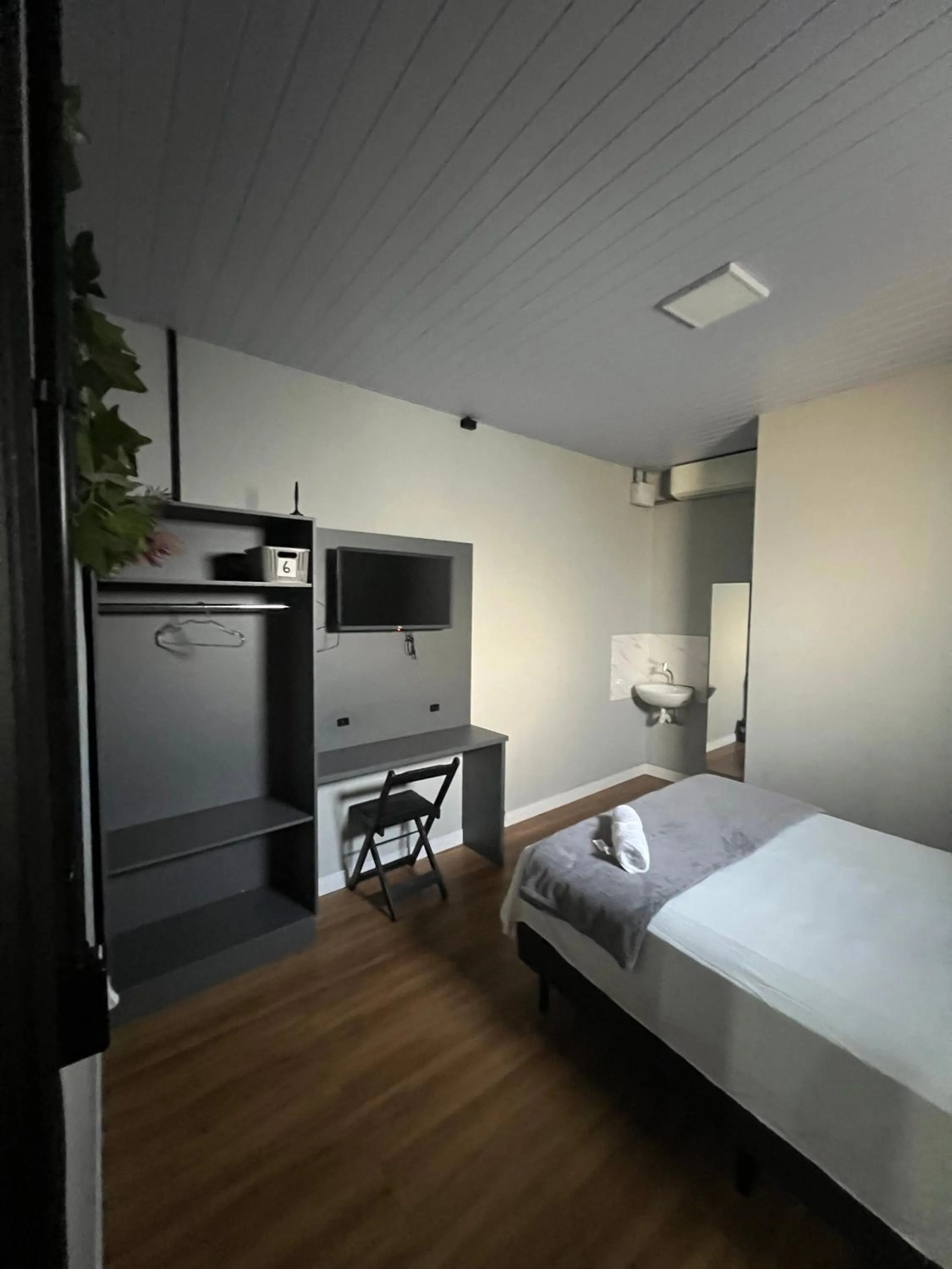 Bedroom, Bed in Esquina 8 Suítes Confort & Hostel