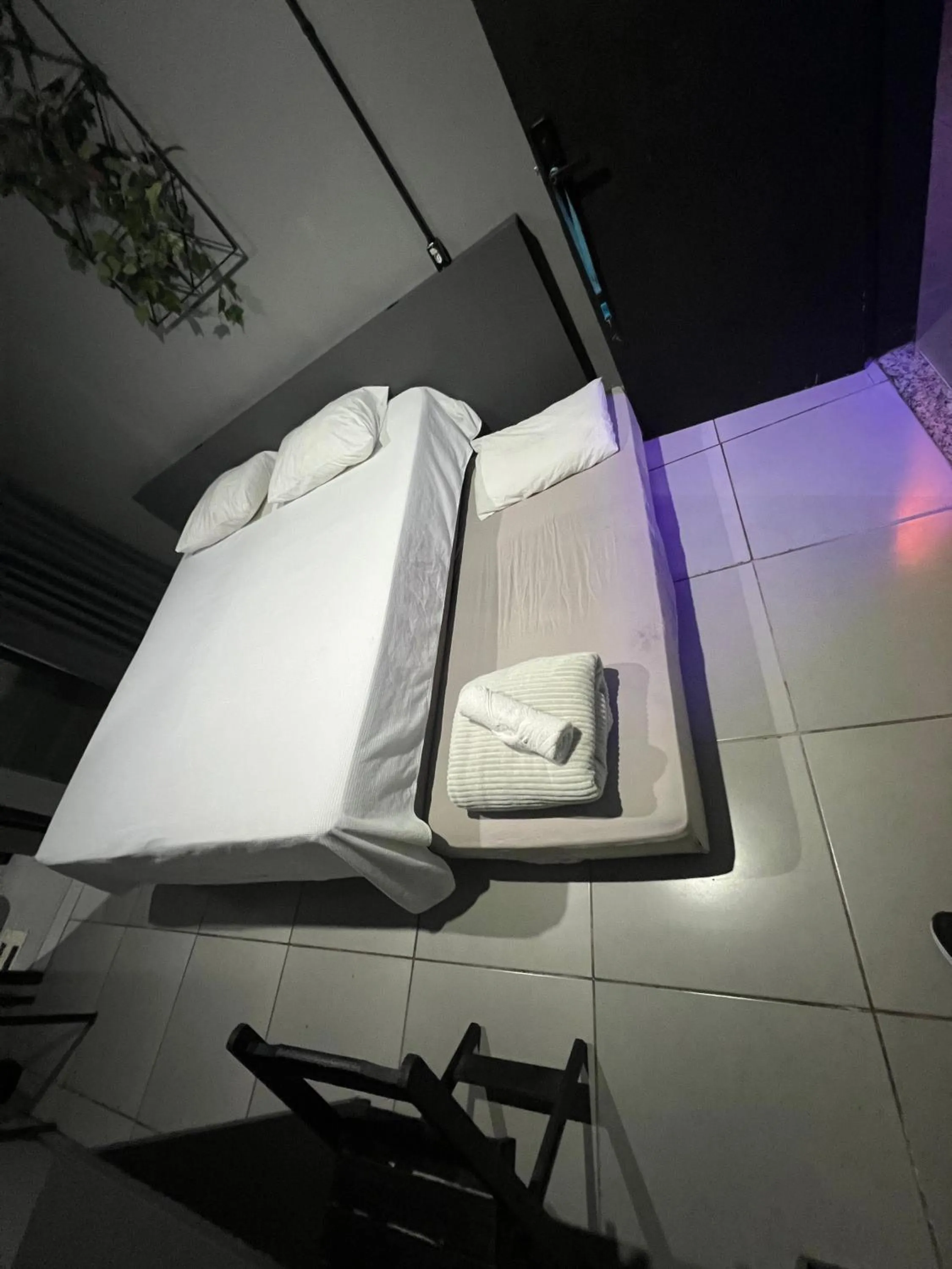 Bedroom in Esquina 8 Suítes Confort & Hostel