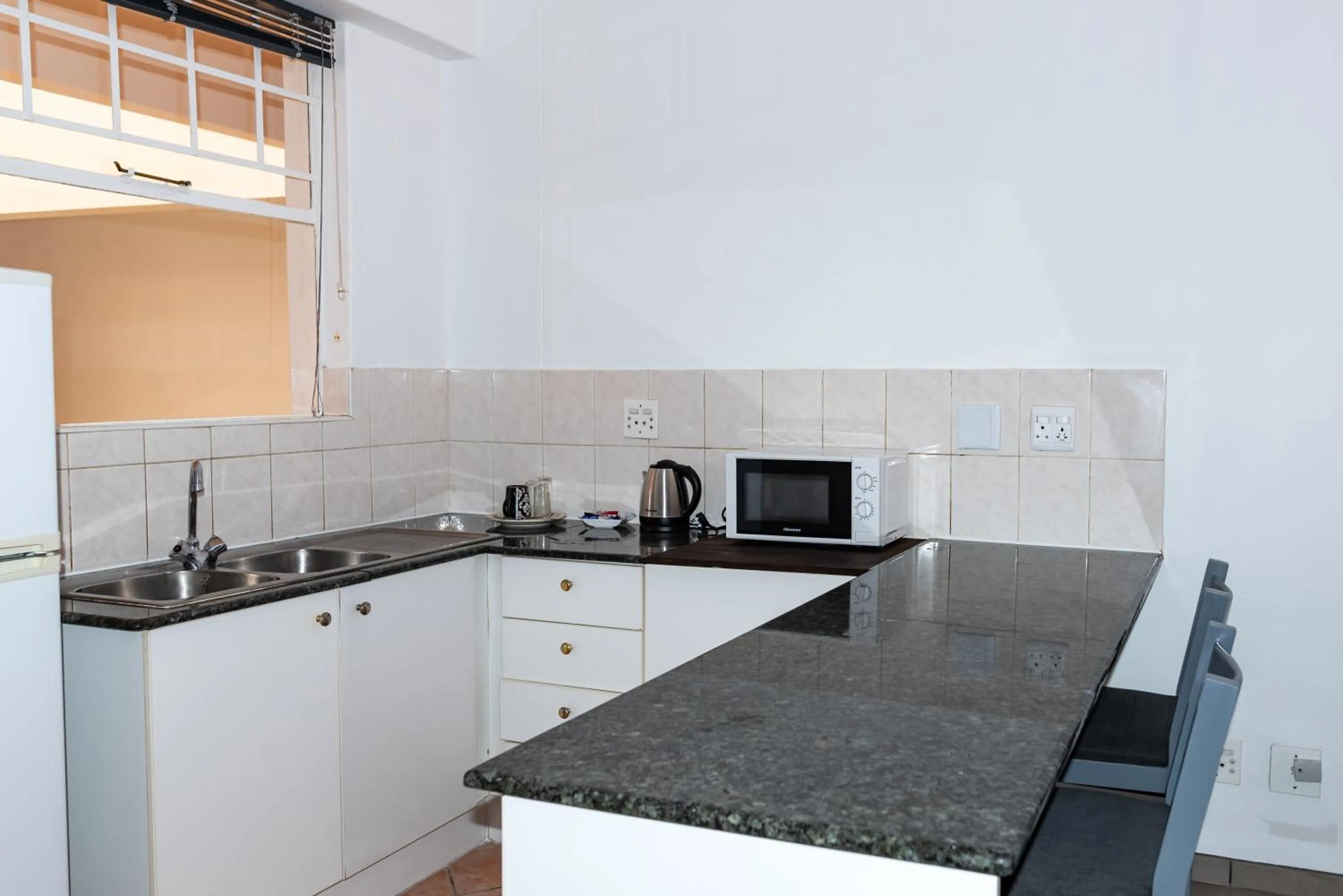 Kitchen or kitchenette in The Jack Rose Hotel, Rosebank, Gautrain