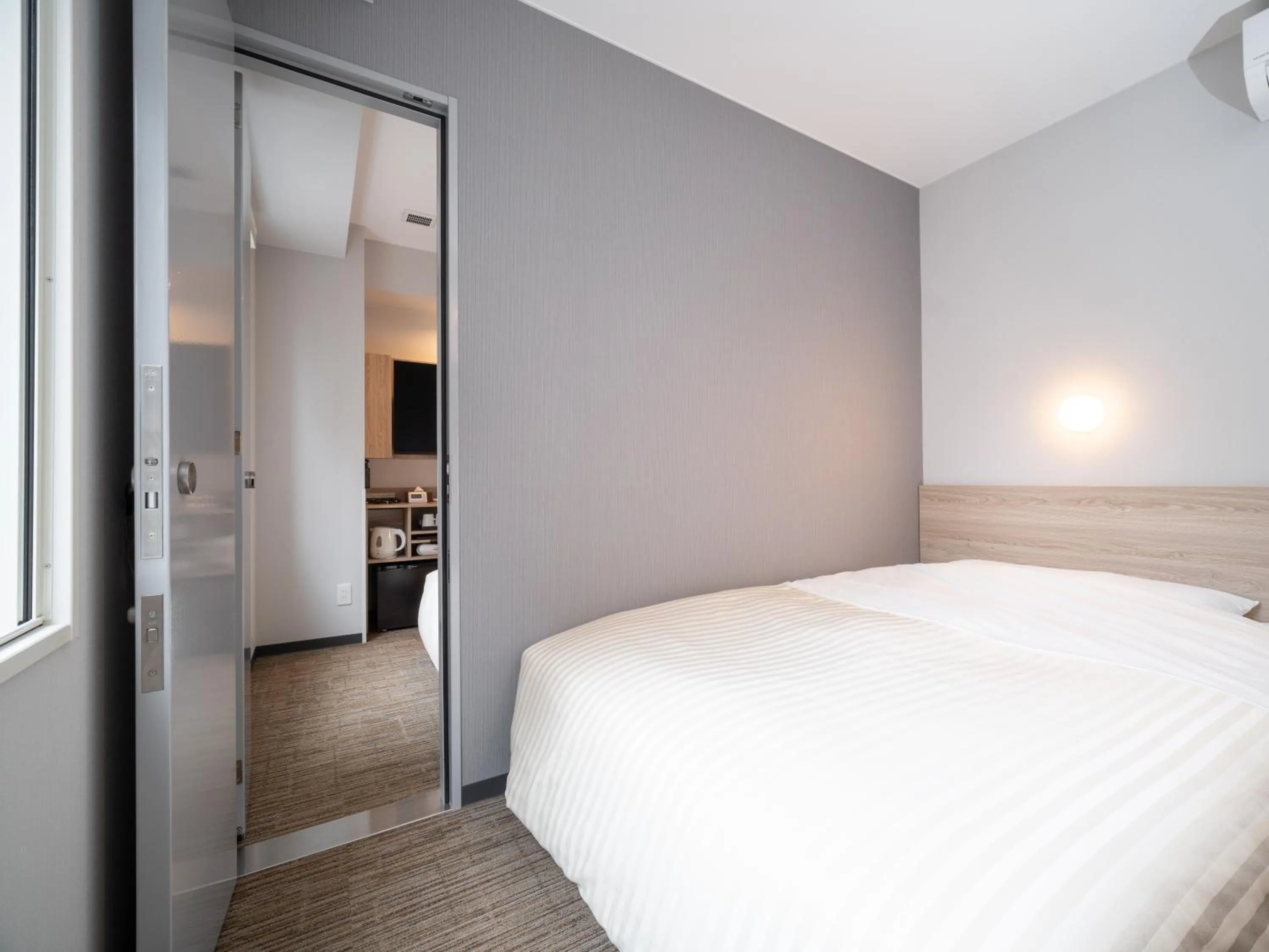 Bedroom, Bed in Super Hotel Okayama Station Higashiguchi