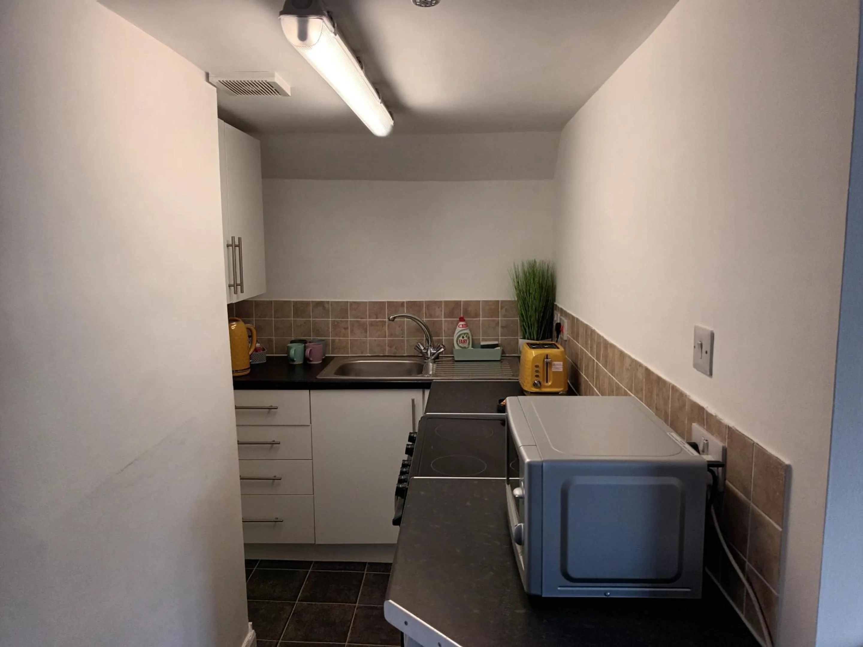 Kitchen or kitchenette in The City Hotel