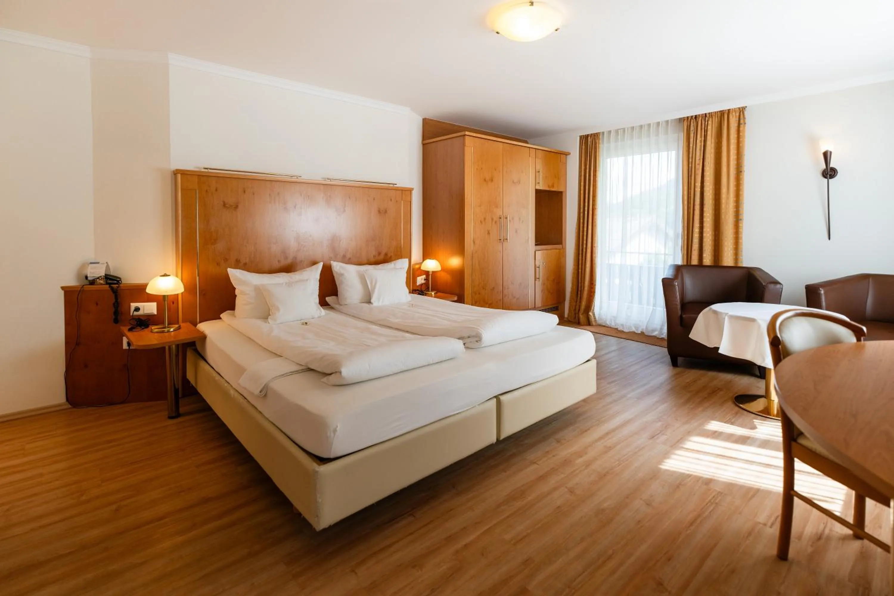 Photo of the whole room, Bed in Wellnesshotel Rothfuß mit Spa und 2 Schwimmbädern