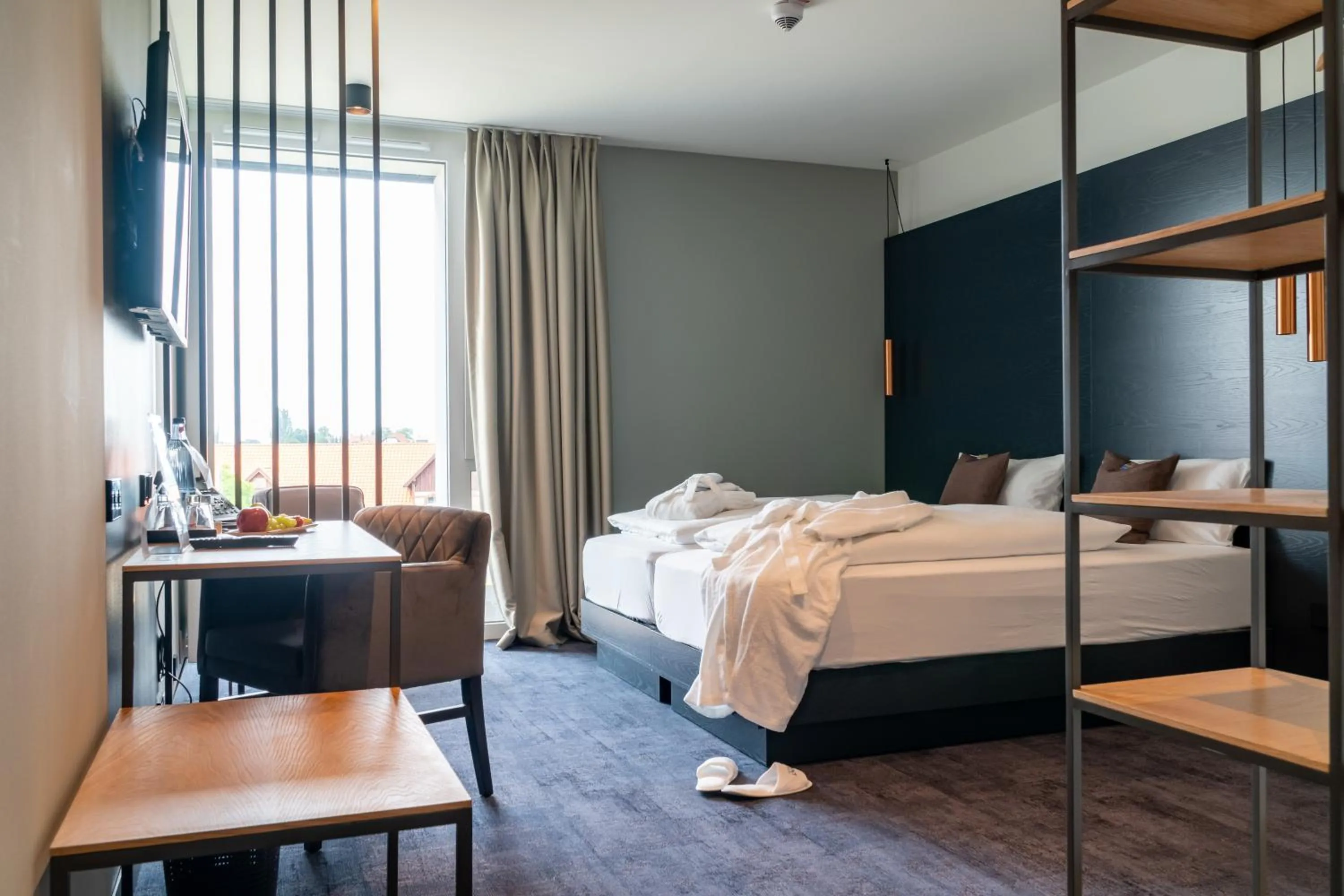 Bed in AKZENT Hotel DÉJANIL