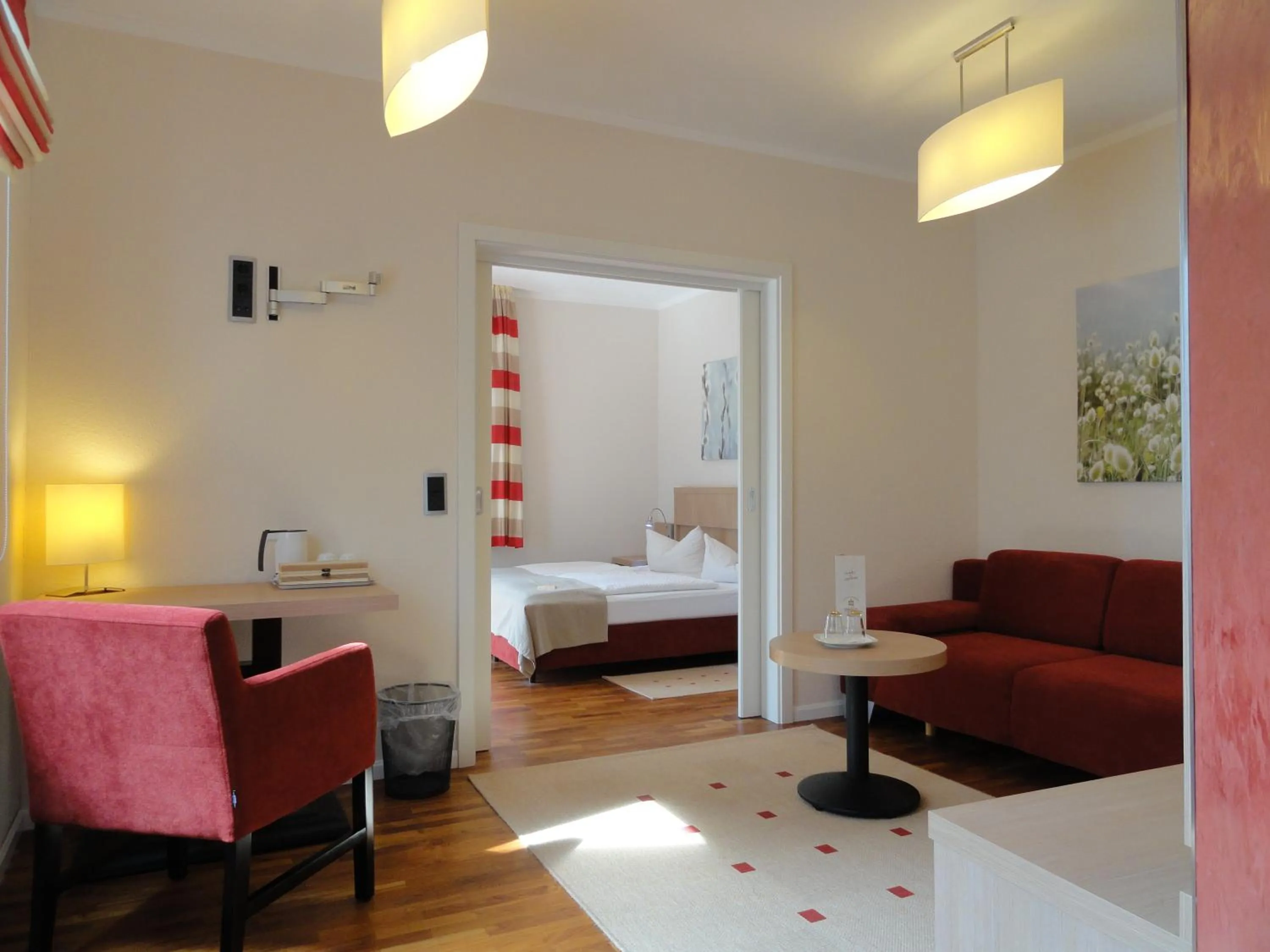 Seating area, Bed in Hotel Sprenz