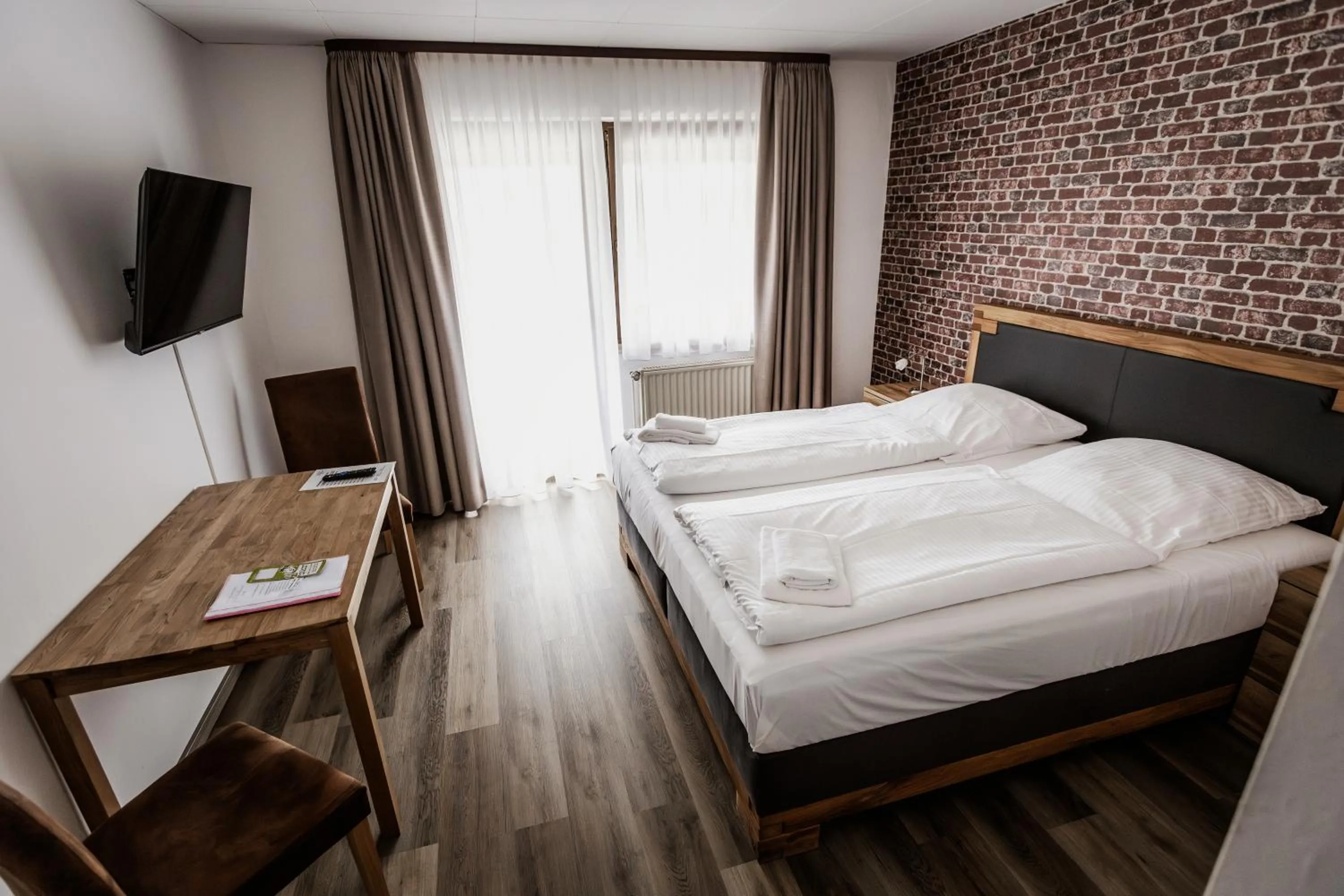 Bed in Hotel-Restaurant Zum Schwalbennest