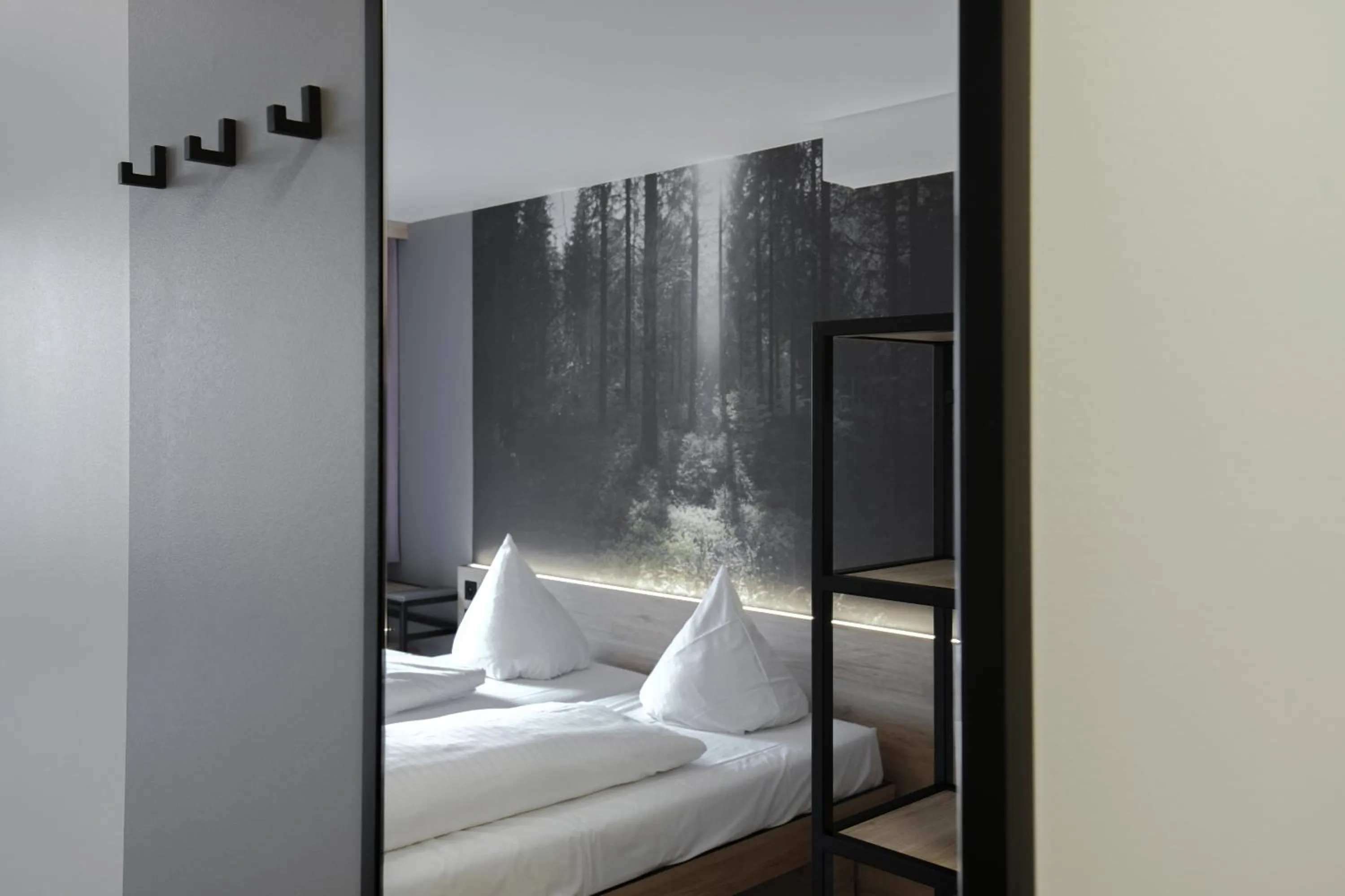 Photo of the whole room, Bed in Hotel Schwarzwälder Hof