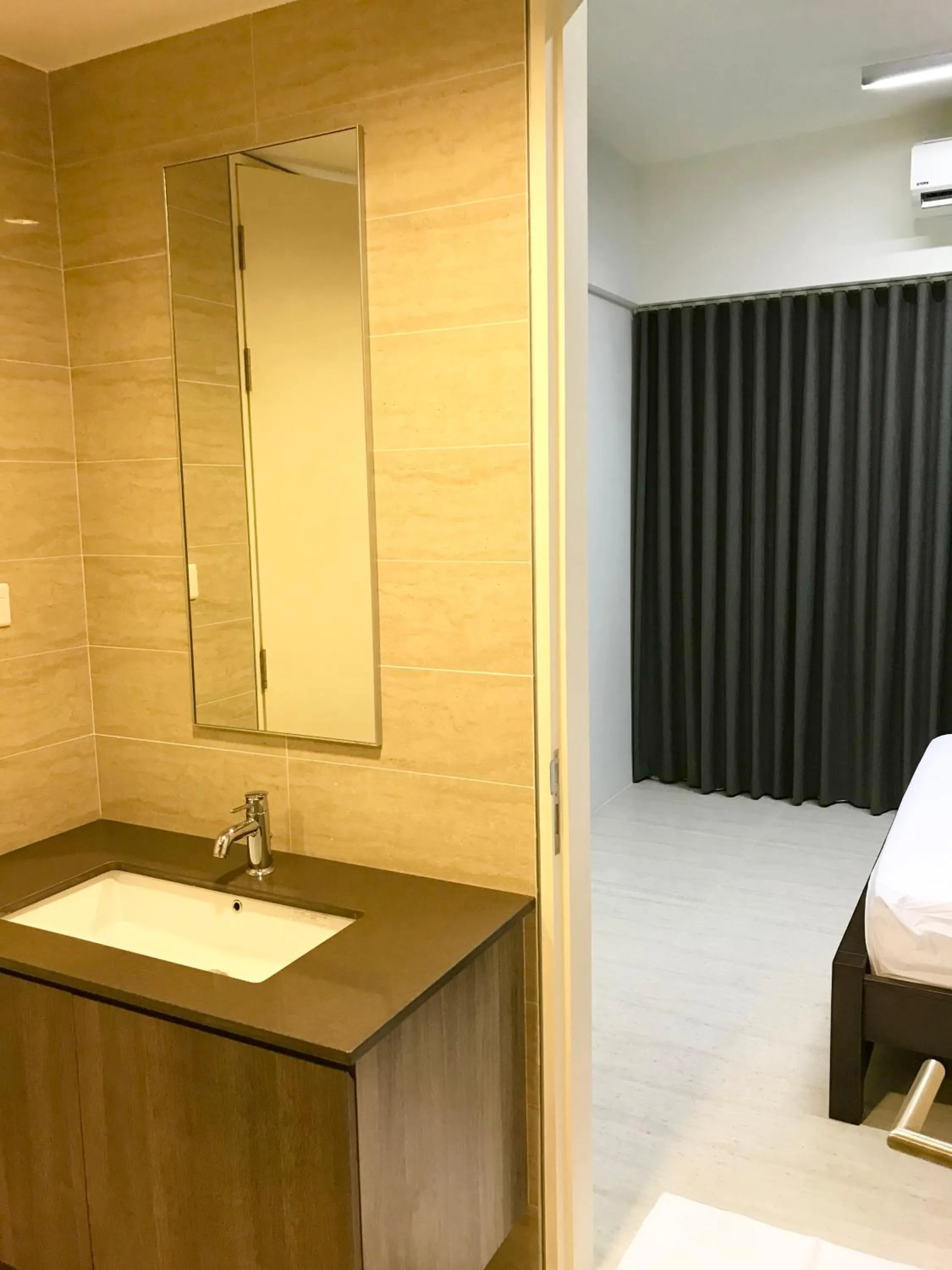 Bathroom in By The Beach - Luxury 2 Bedrooms Family Suite