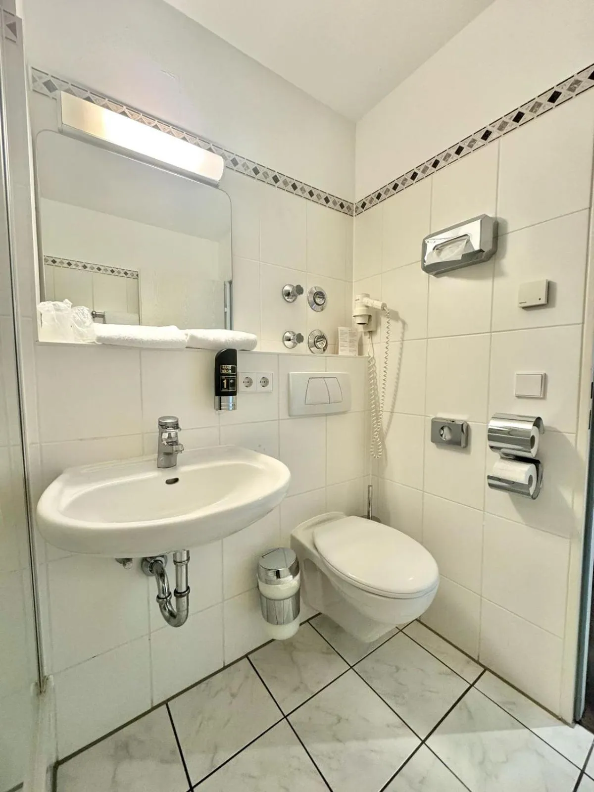 Bathroom in MY Parkhotel by AR Hotels