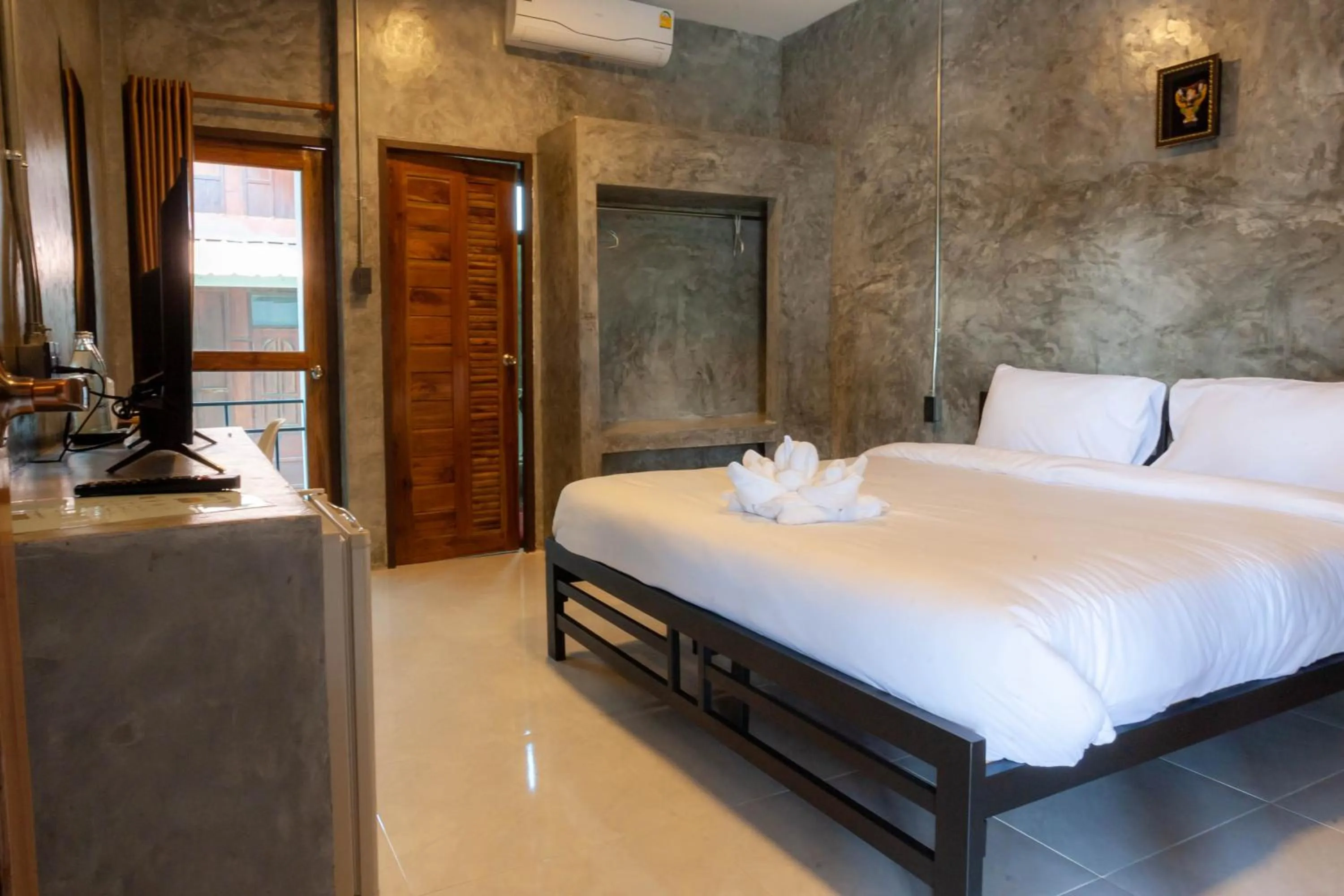 Bed in Nan Arena Place