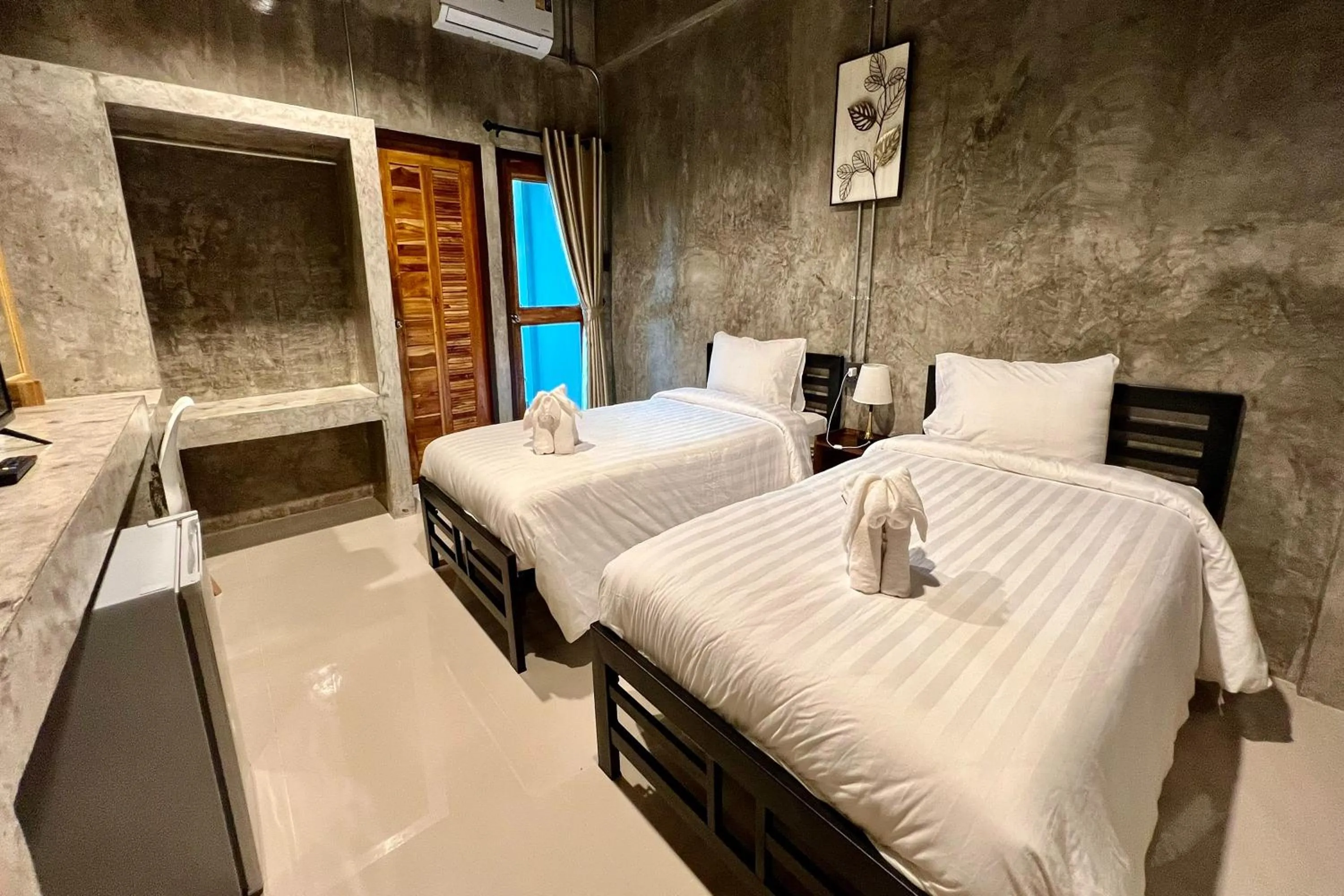 Bed in Nan Arena Place