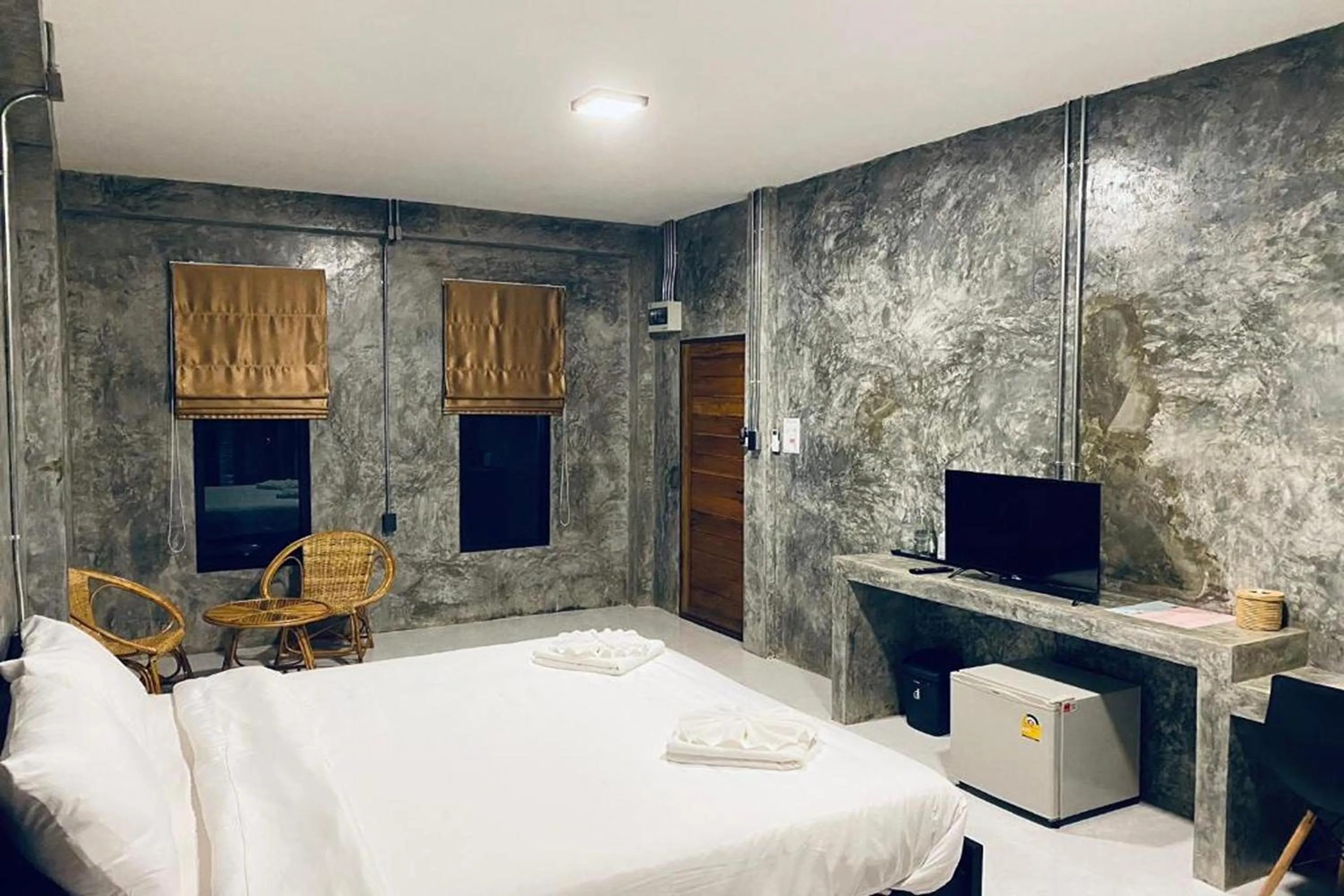 Bed in Nan Arena Place