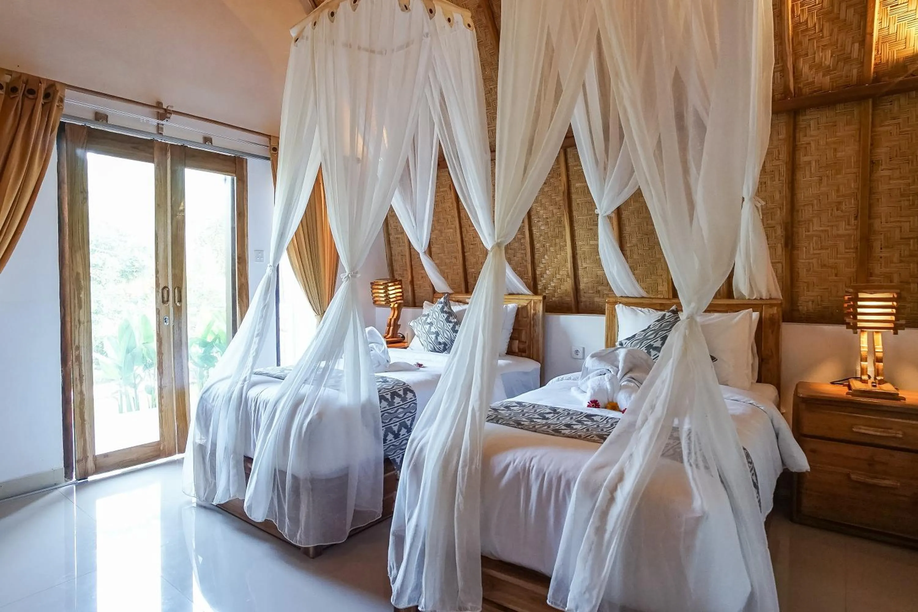 Bed in Penida Sunset Ocean View Bungalows