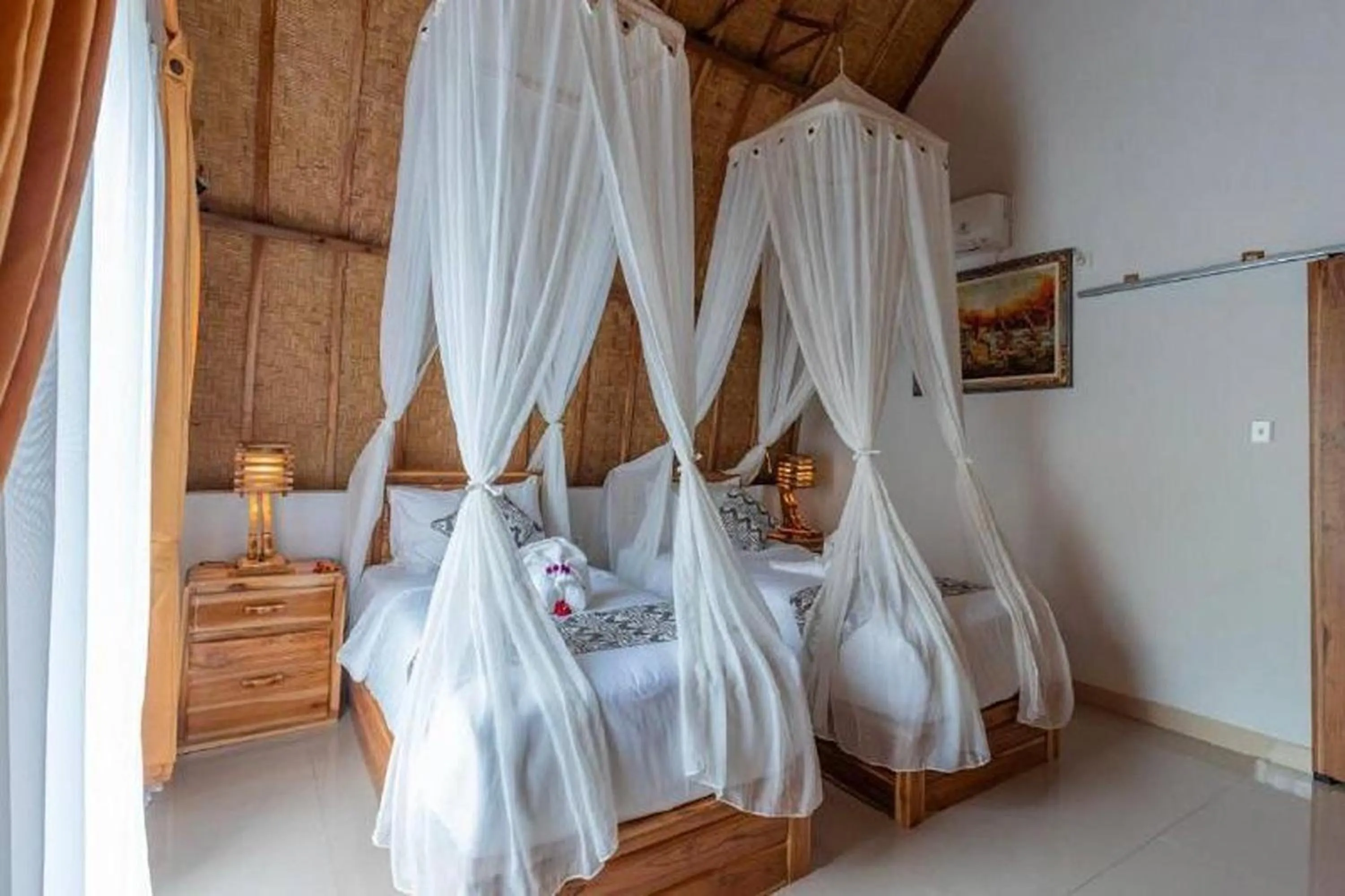 Bed in Penida Sunset Ocean View Bungalows