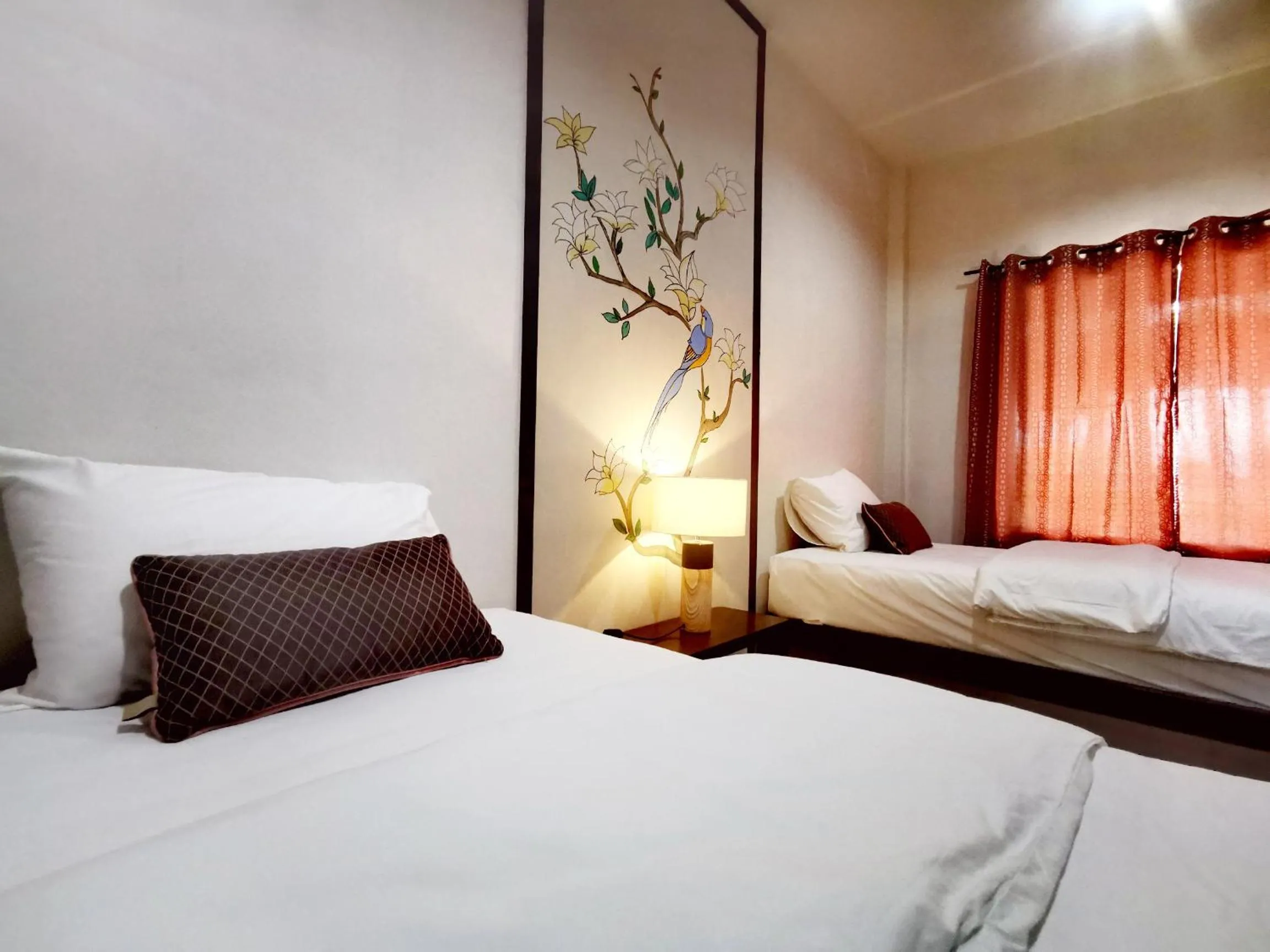 Bed in Nararin Garden House